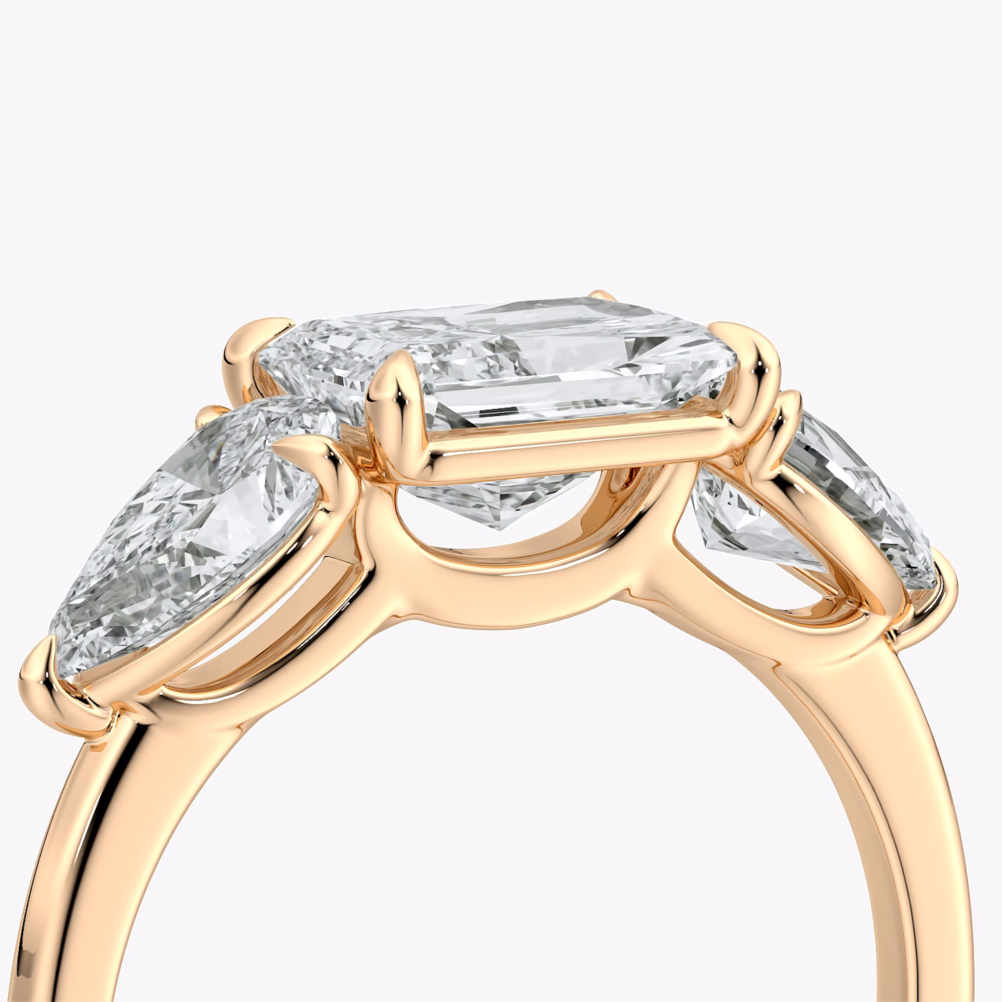 The Three Stone | Radiant | 14k | Rose Gold | bandAccent: Plain | diamondOrientation: horizontal | sideStoneCarat: 0.50ct | sideStoneShape: Pear | caratWeight: other