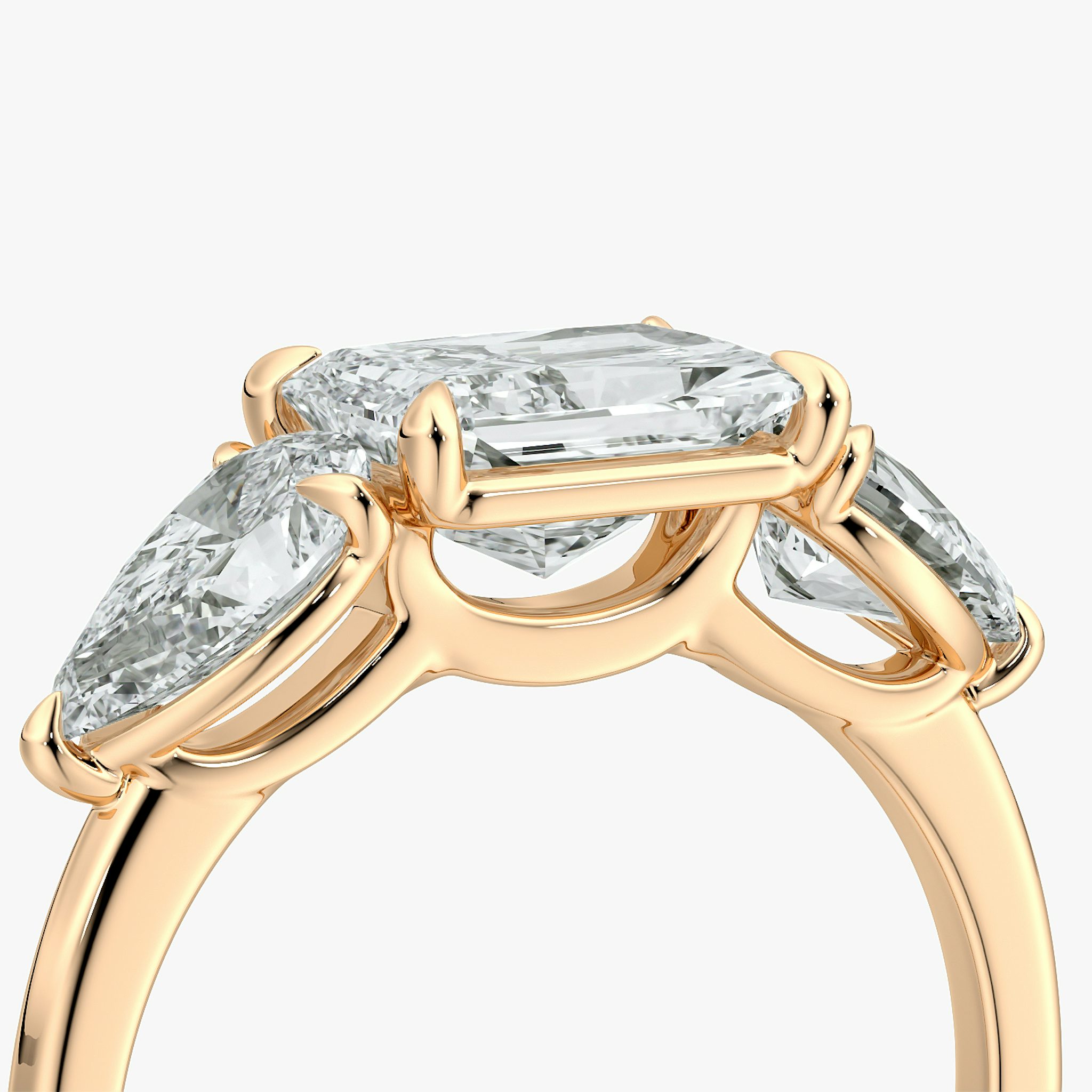 The Three Stone | Radiant | 14k | Rose Gold | bandAccent: Plain | diamondOrientation: horizontal | sideStoneCarat: 0.50ct | sideStoneShape: Pear | caratWeight: other