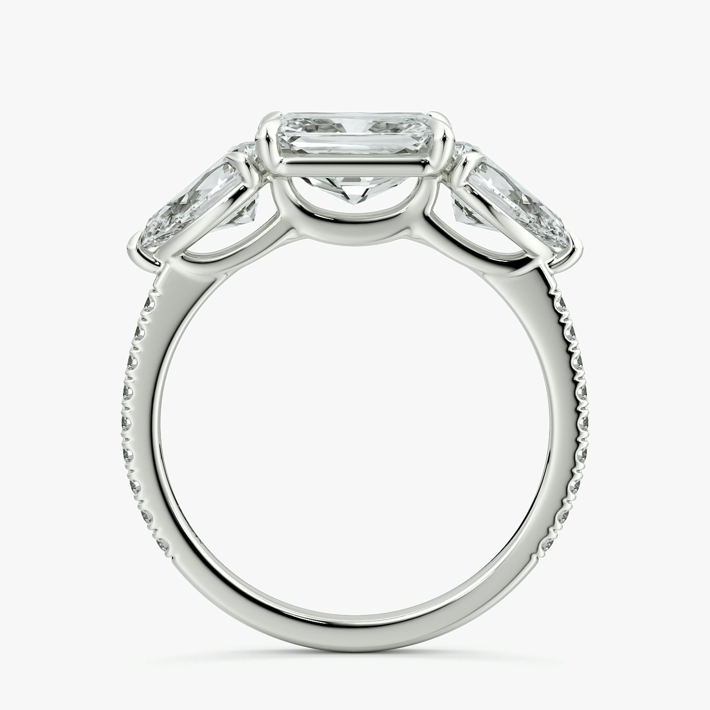 The Three Stone | Radiant | Platinum | bandAccent: Pavé | diamondOrientation: horizontal | sideStoneCarat: 0.50ct | sideStoneShape: Pear | caratWeight: other