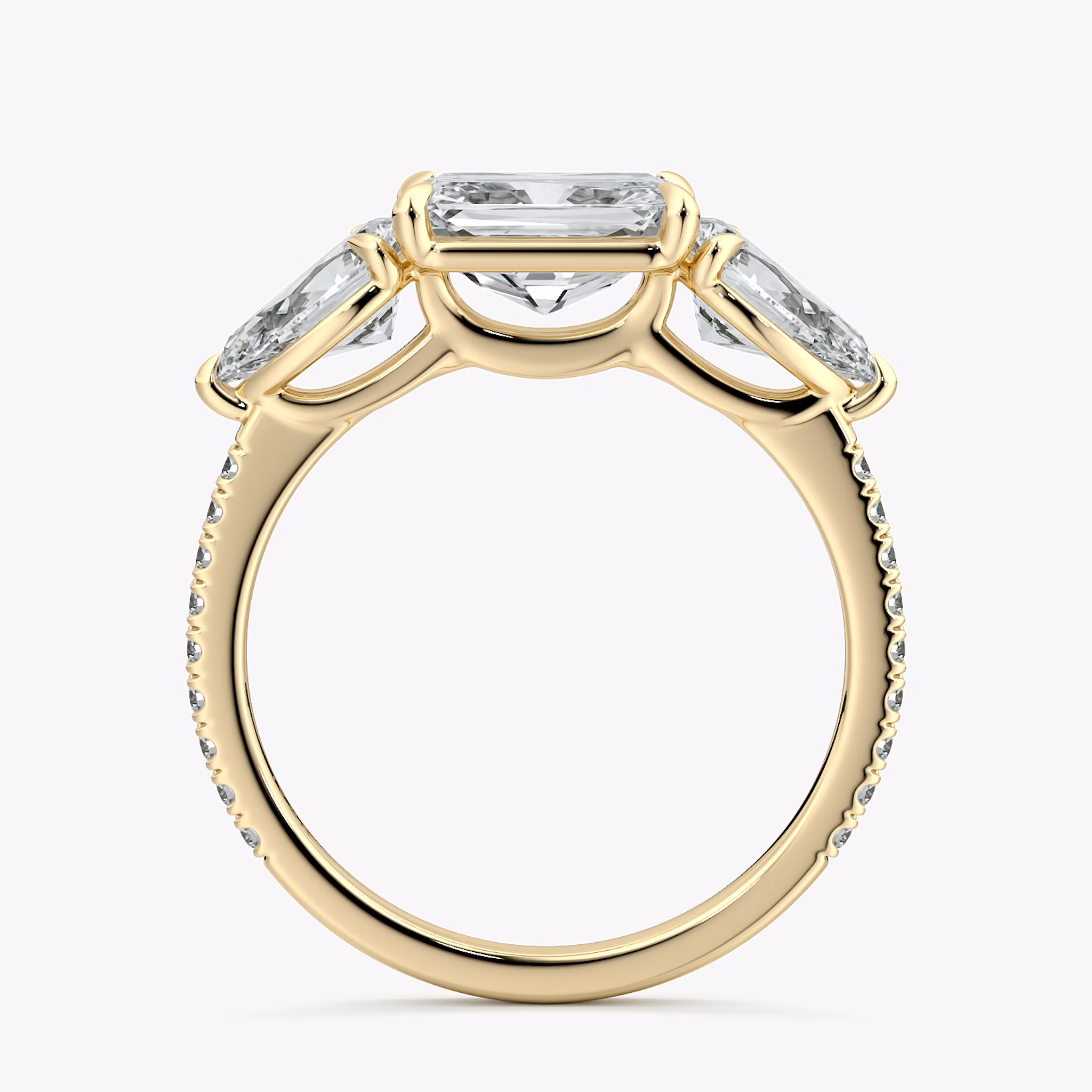 The Three Stone | Radiant | 18k | Yellow Gold | bandAccent: Pavé | diamondOrientation: horizontal | sideStoneCarat: 0.50ct | sideStoneShape: Pear | caratWeight: other
