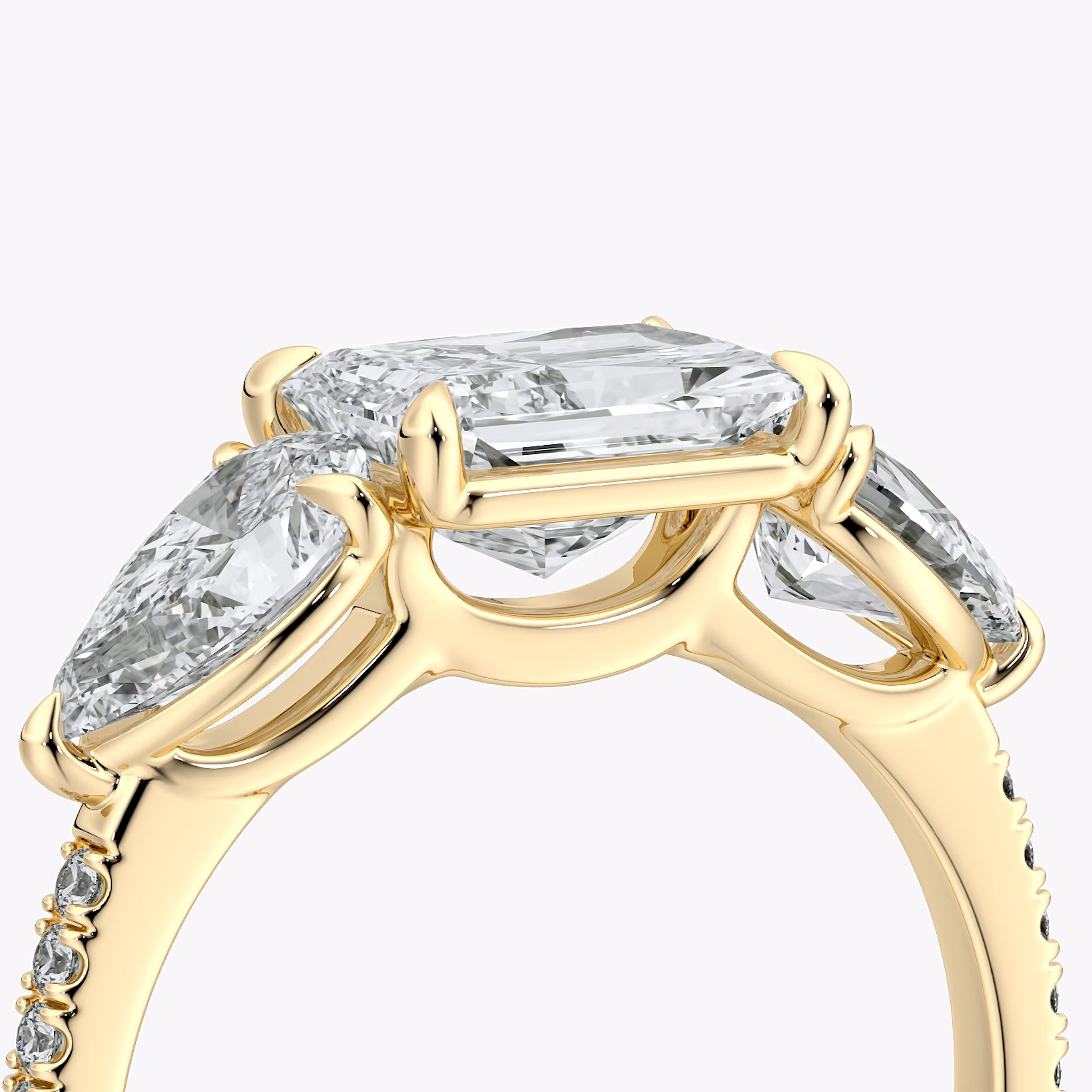 The Three Stone | Radiant | 18k | Yellow Gold | bandAccent: Pavé | diamondOrientation: horizontal | sideStoneCarat: 0.50ct | sideStoneShape: Pear | caratWeight: other