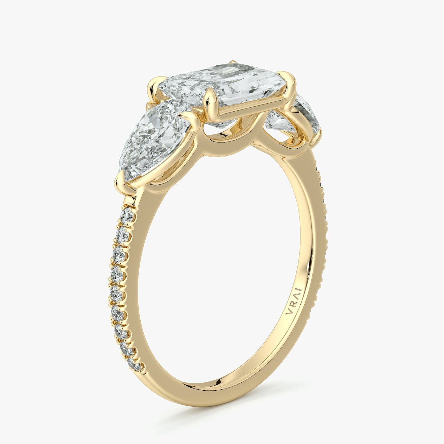 The Three Stone | Radiant | 18k | Yellow Gold | bandAccent: Pavé | diamondOrientation: horizontal | sideStoneCarat: 0.50ct | sideStoneShape: Pear | caratWeight: other
