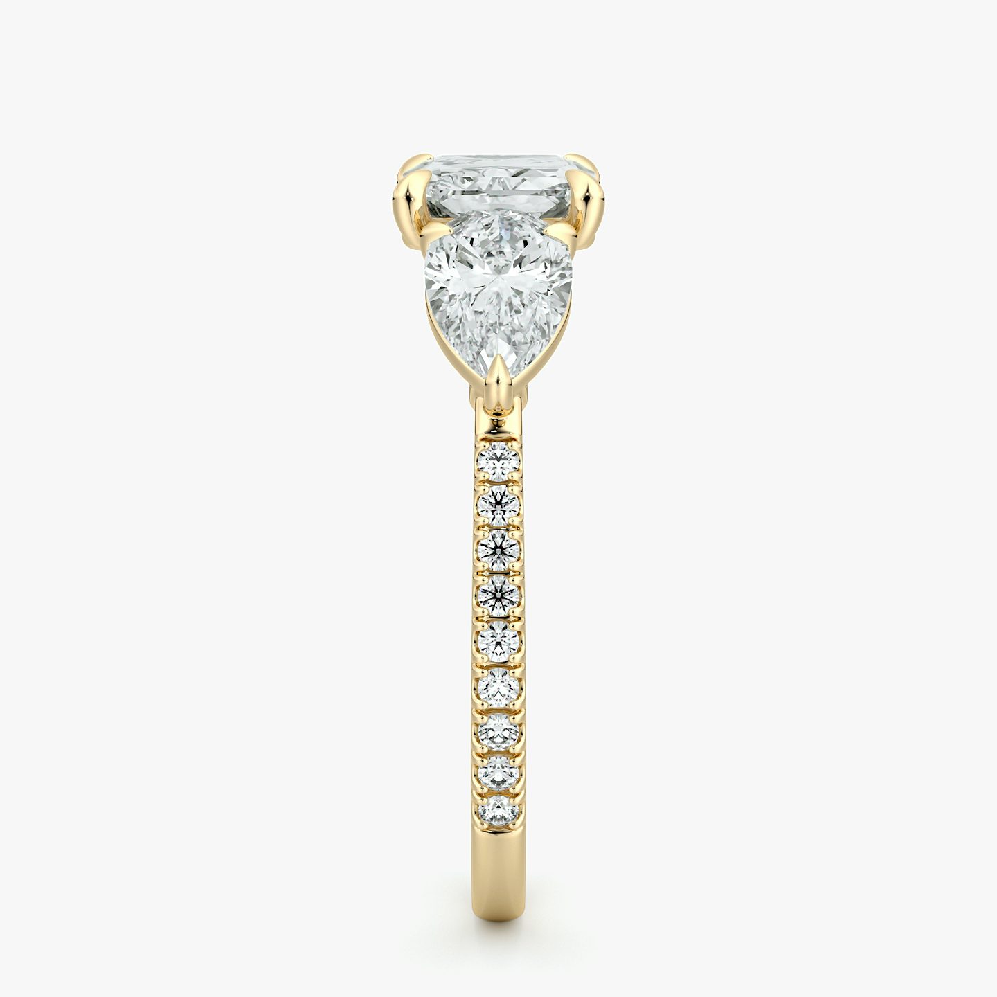 The Three Stone | Radiant | 18k | Yellow Gold | bandAccent: Pavé | diamondOrientation: horizontal | sideStoneCarat: 0.50ct | sideStoneShape: Pear | caratWeight: other