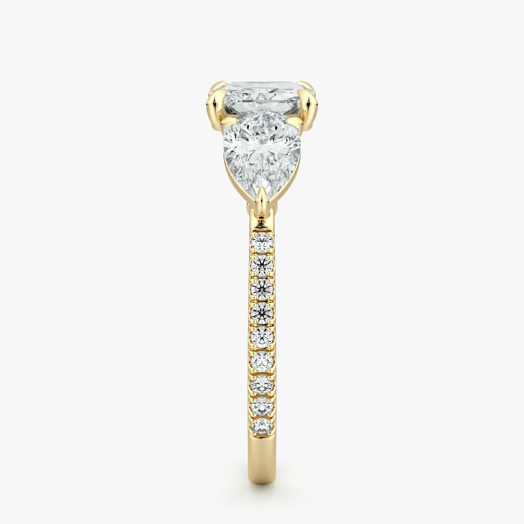 The Three Stone | Radiant | 18k | Yellow Gold | bandAccent: Pavé | diamondOrientation: horizontal | sideStoneCarat: 0.50ct | sideStoneShape: Pear | caratWeight: other
