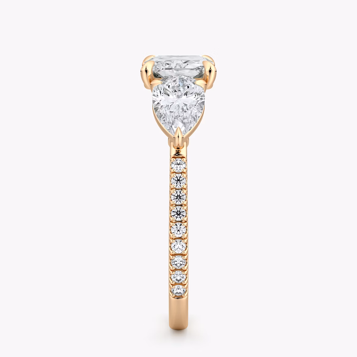 The Three Stone | Radiant | 14k | Rose Gold | bandAccent: Pavé | diamondOrientation: horizontal | sideStoneCarat: 0.50ct | sideStoneShape: Pear | caratWeight: other