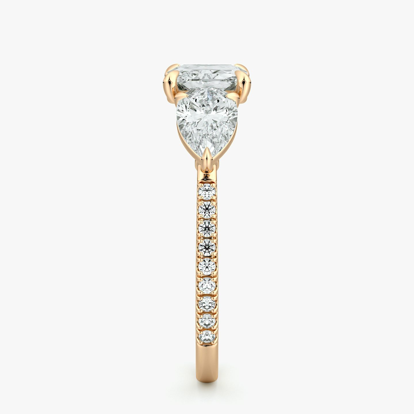 The Three Stone | Radiant | 14k | Rose Gold | bandAccent: Pavé | diamondOrientation: horizontal | sideStoneCarat: 0.50ct | sideStoneShape: Pear | caratWeight: other