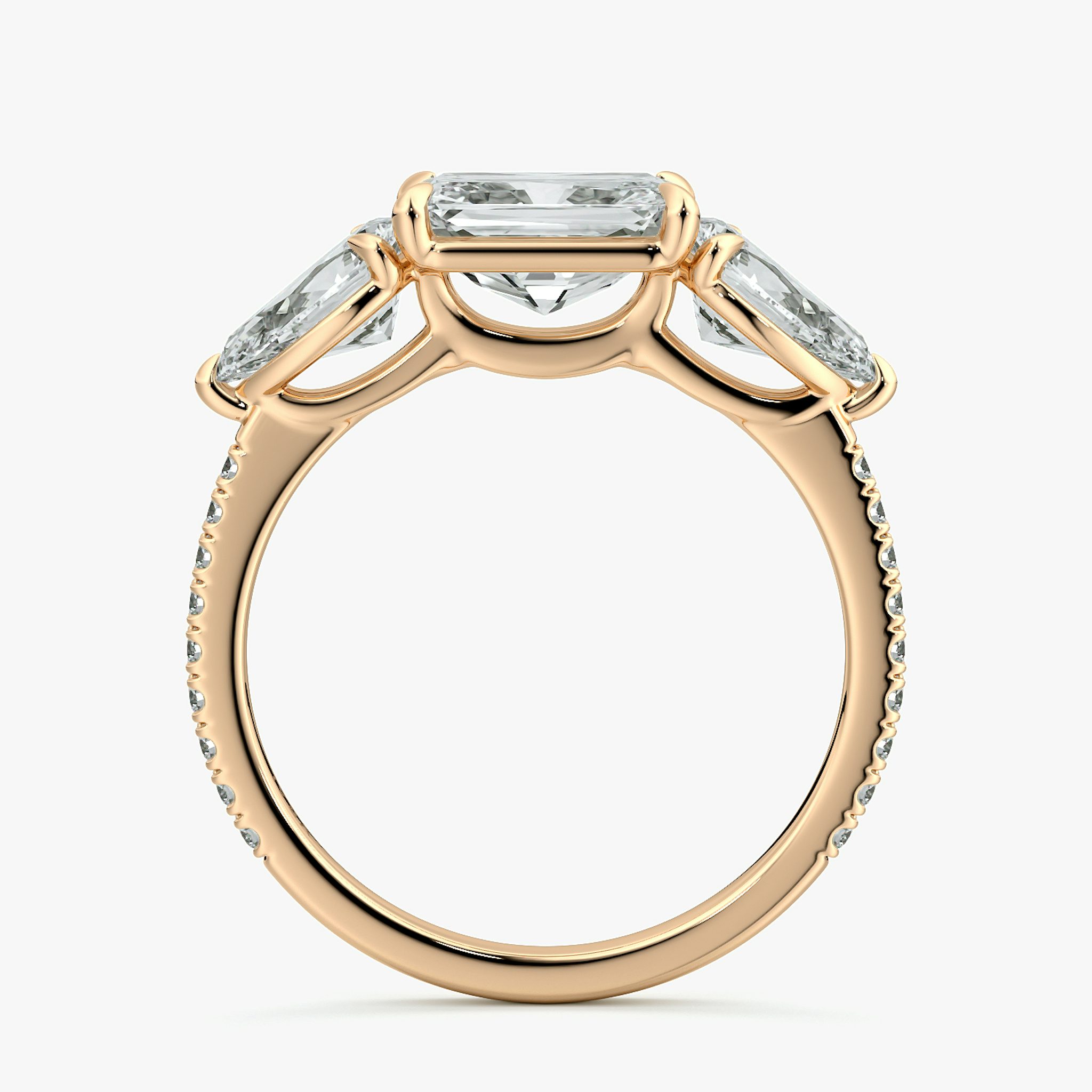 The Three Stone | Radiant | 14k | Rose Gold | bandAccent: Pavé | diamondOrientation: horizontal | sideStoneCarat: 0.50ct | sideStoneShape: Pear | caratWeight: other