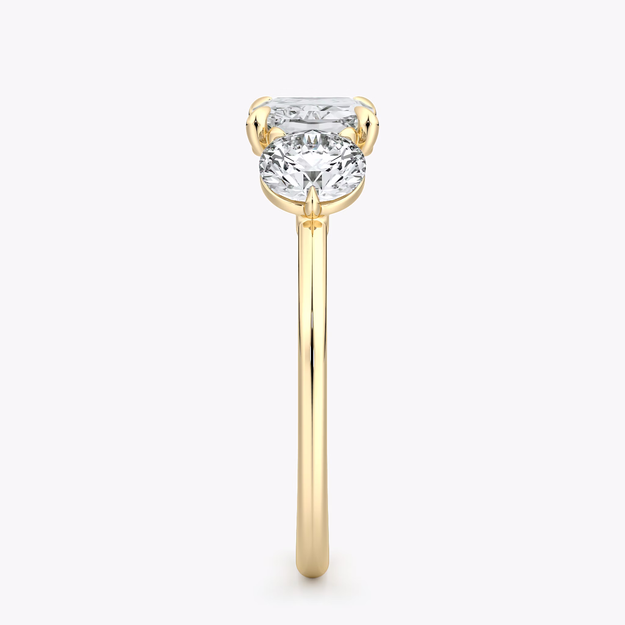 The Three Stone | Radiant | 18k | Yellow Gold | bandAccent: Plain | diamondOrientation: horizontal | sideStoneCarat: 0.50ct | sideStoneShape: Round Brilliant | caratWeight: other