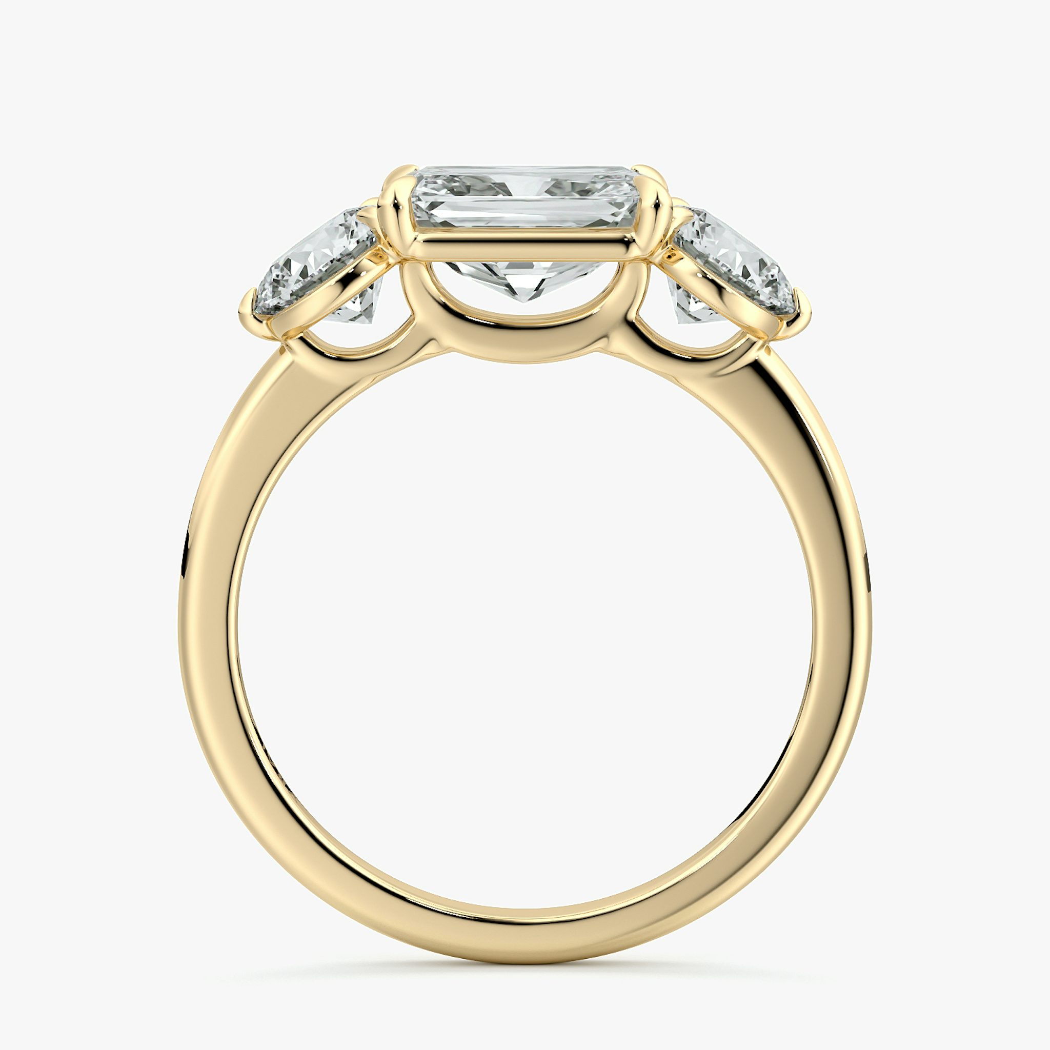 The Three Stone | Radiant | 18k | Yellow Gold | bandAccent: Plain | diamondOrientation: horizontal | sideStoneCarat: 0.50ct | sideStoneShape: Round Brilliant | caratWeight: other