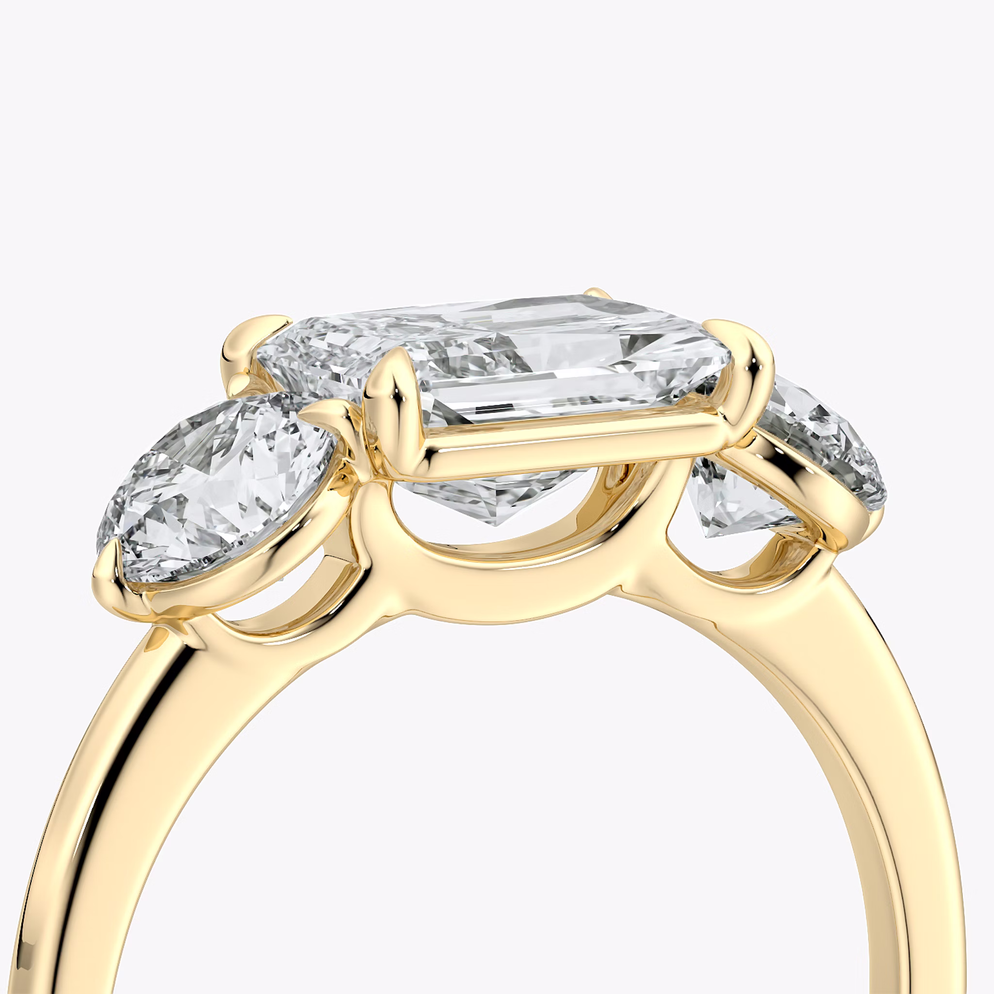 The Three Stone | Radiant | 18k | Yellow Gold | bandAccent: Plain | diamondOrientation: horizontal | sideStoneCarat: 0.50ct | sideStoneShape: Round Brilliant | caratWeight: other