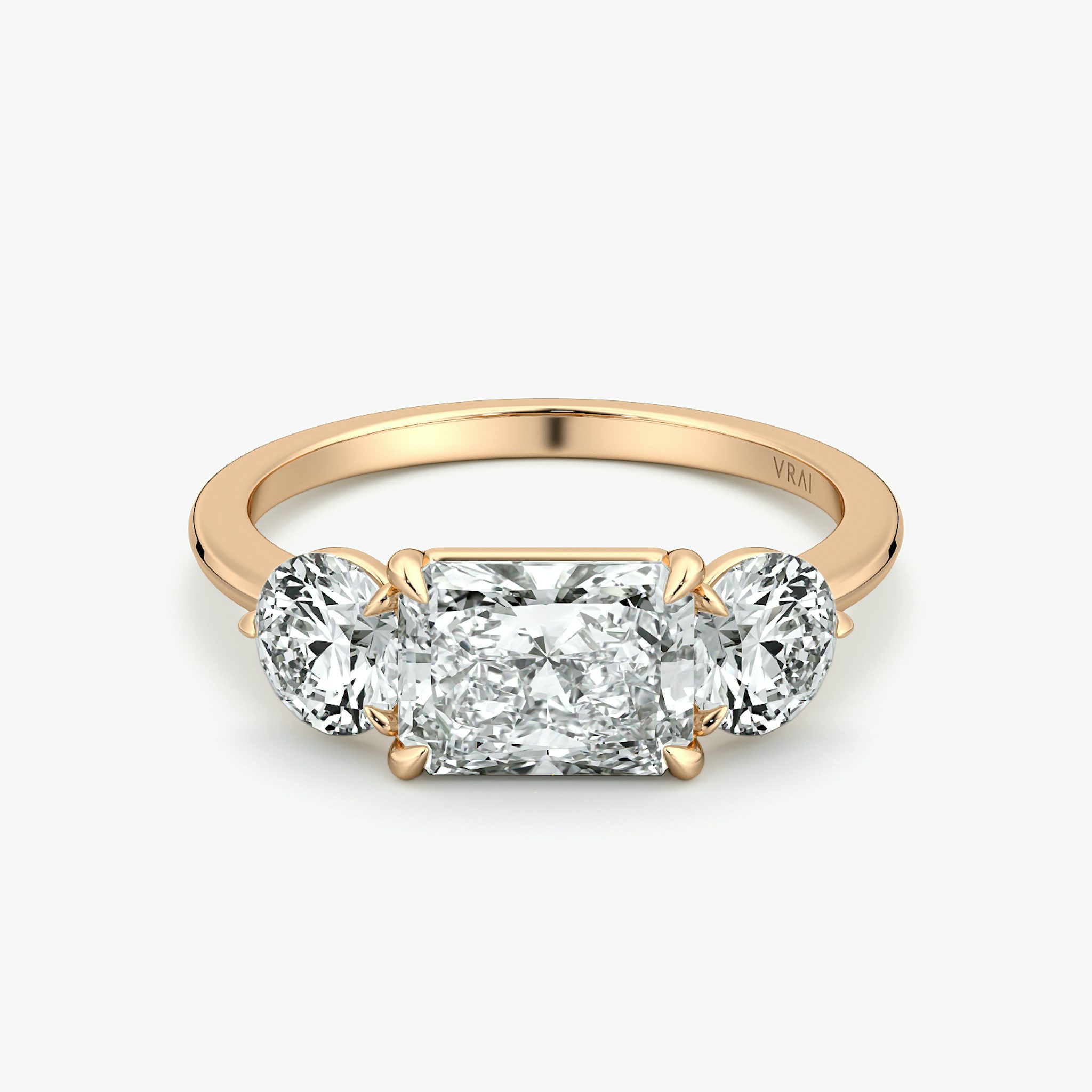 The Three Stone | Radiant | 14k | Rose Gold | bandAccent: Plain | diamondOrientation: horizontal | sideStoneCarat: 0.50ct | sideStoneShape: Round Brilliant | caratWeight: other
