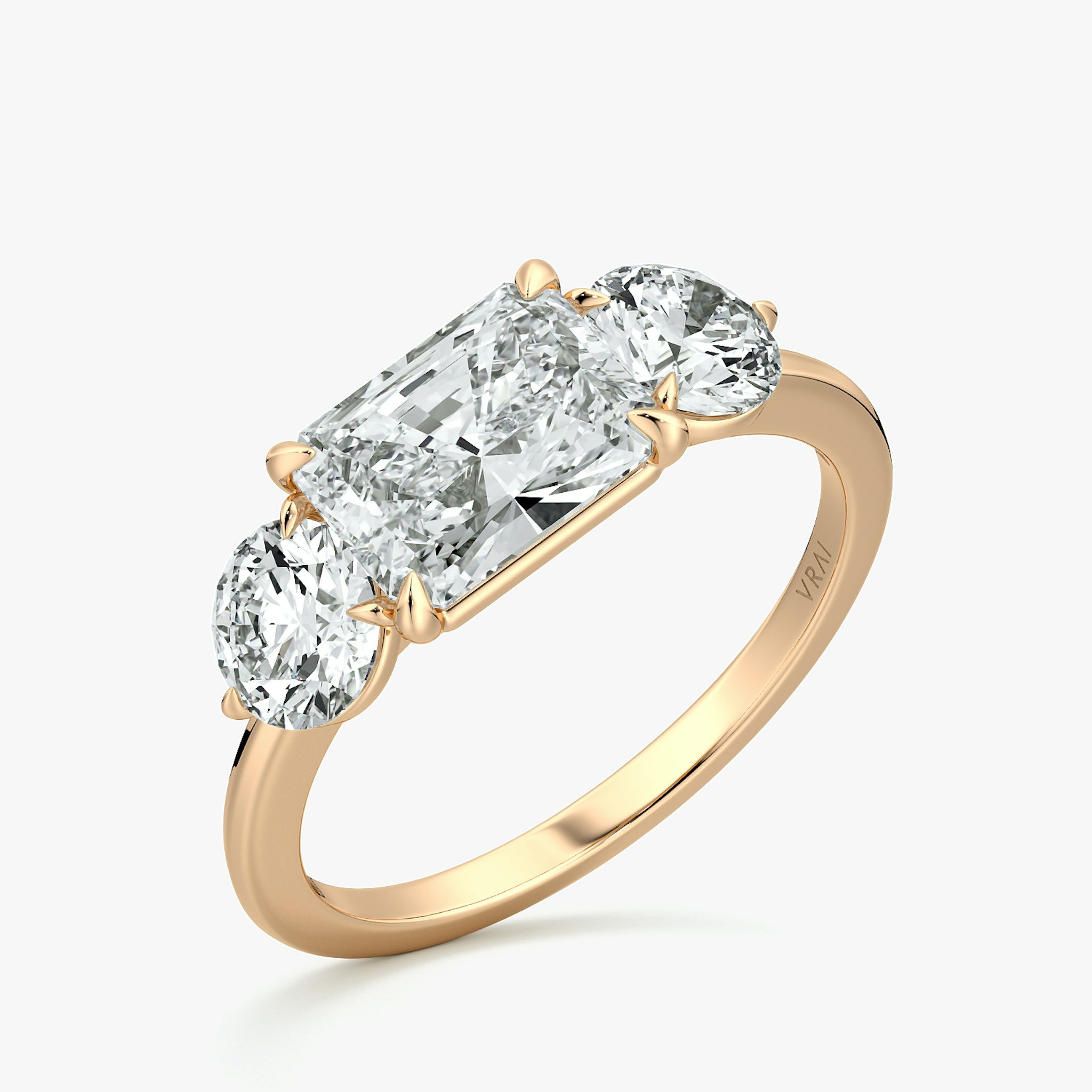 The Three Stone | Radiant | 14k | Rose Gold | bandAccent: Plain | diamondOrientation: horizontal | sideStoneCarat: 0.50ct | sideStoneShape: Round Brilliant | caratWeight: other