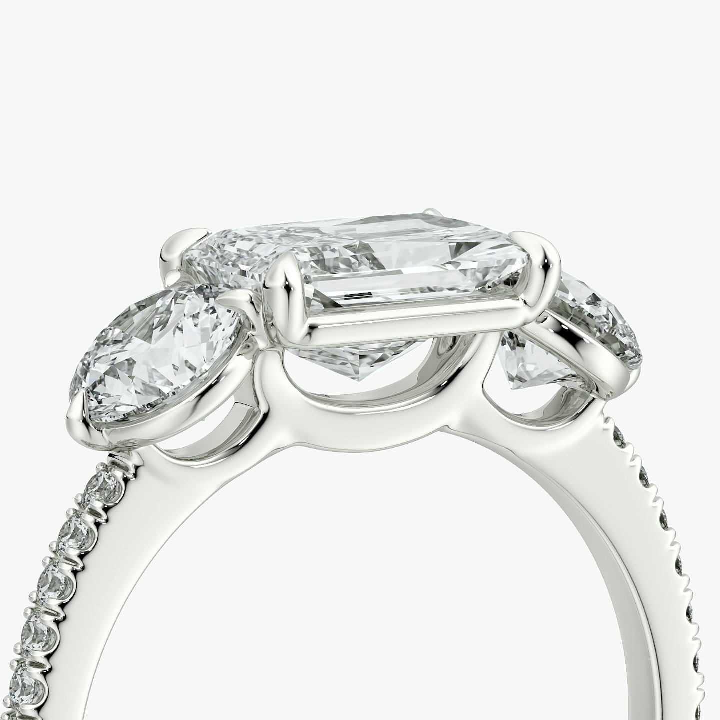 The Three Stone | Radiant | 18k | White Gold | bandAccent: Pavé | diamondOrientation: horizontal | sideStoneCarat: 0.50ct | sideStoneShape: Round Brilliant | caratWeight: other