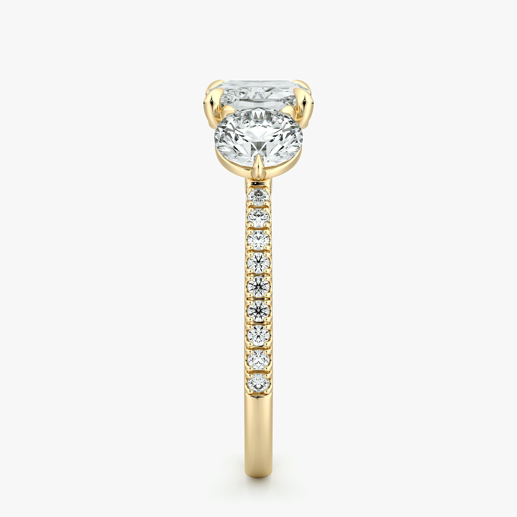 The Three Stone | Radiant | 18k | Yellow Gold | bandAccent: Pavé | diamondOrientation: horizontal | sideStoneCarat: 0.50ct | sideStoneShape: Round Brilliant | caratWeight: other