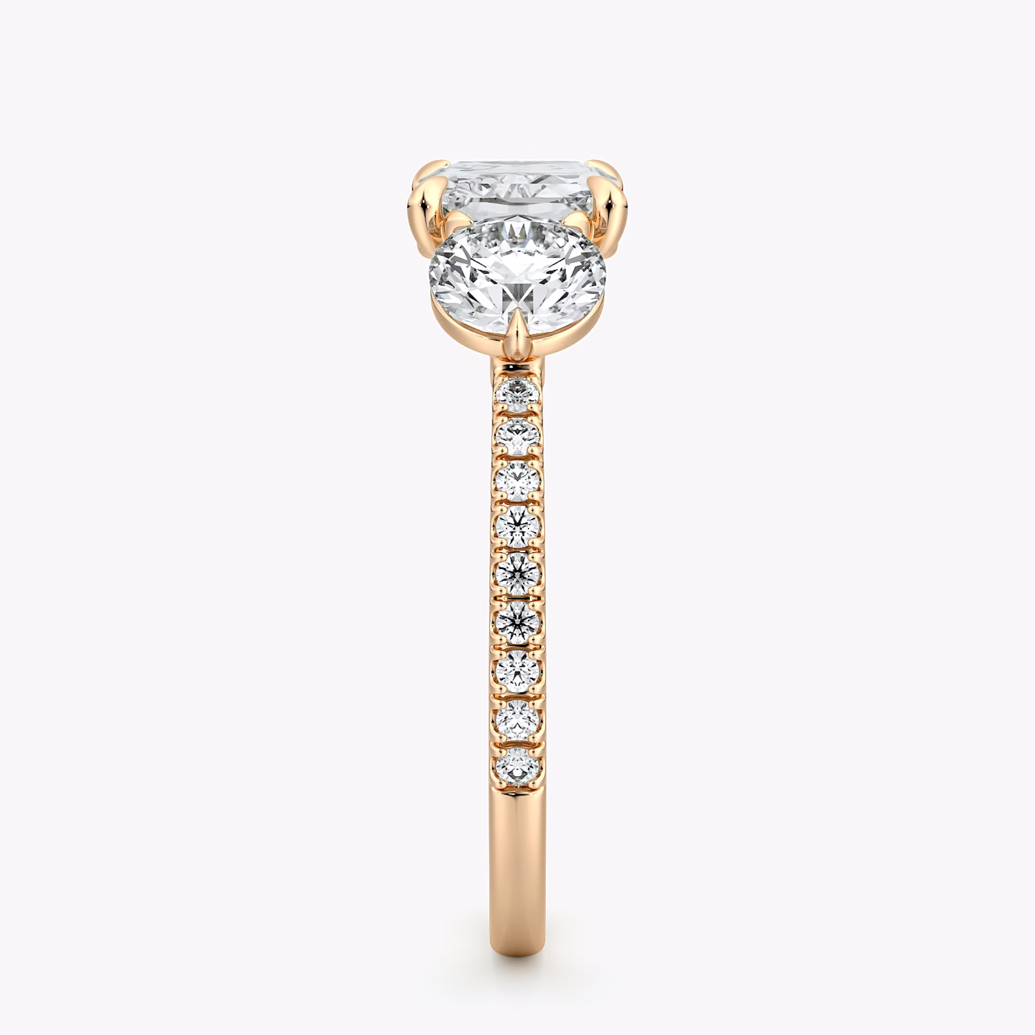 The Three Stone | Radiant | 14k | Rose Gold | bandAccent: Pavé | diamondOrientation: horizontal | sideStoneCarat: 0.50ct | sideStoneShape: Round Brilliant | caratWeight: other