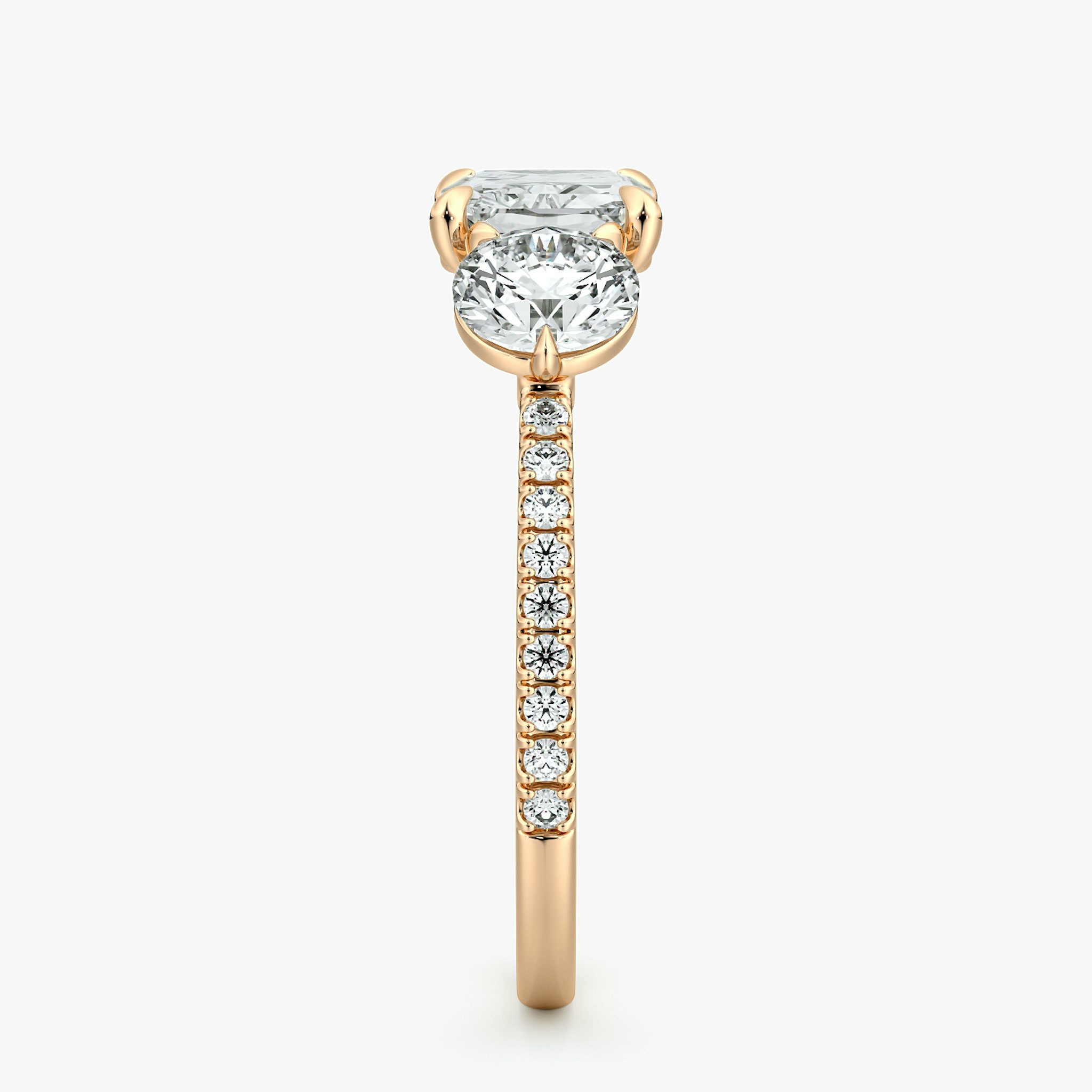 The Three Stone | Radiant | 14k | Rose Gold | bandAccent: Pavé | diamondOrientation: horizontal | sideStoneCarat: 0.50ct | sideStoneShape: Round Brilliant | caratWeight: other