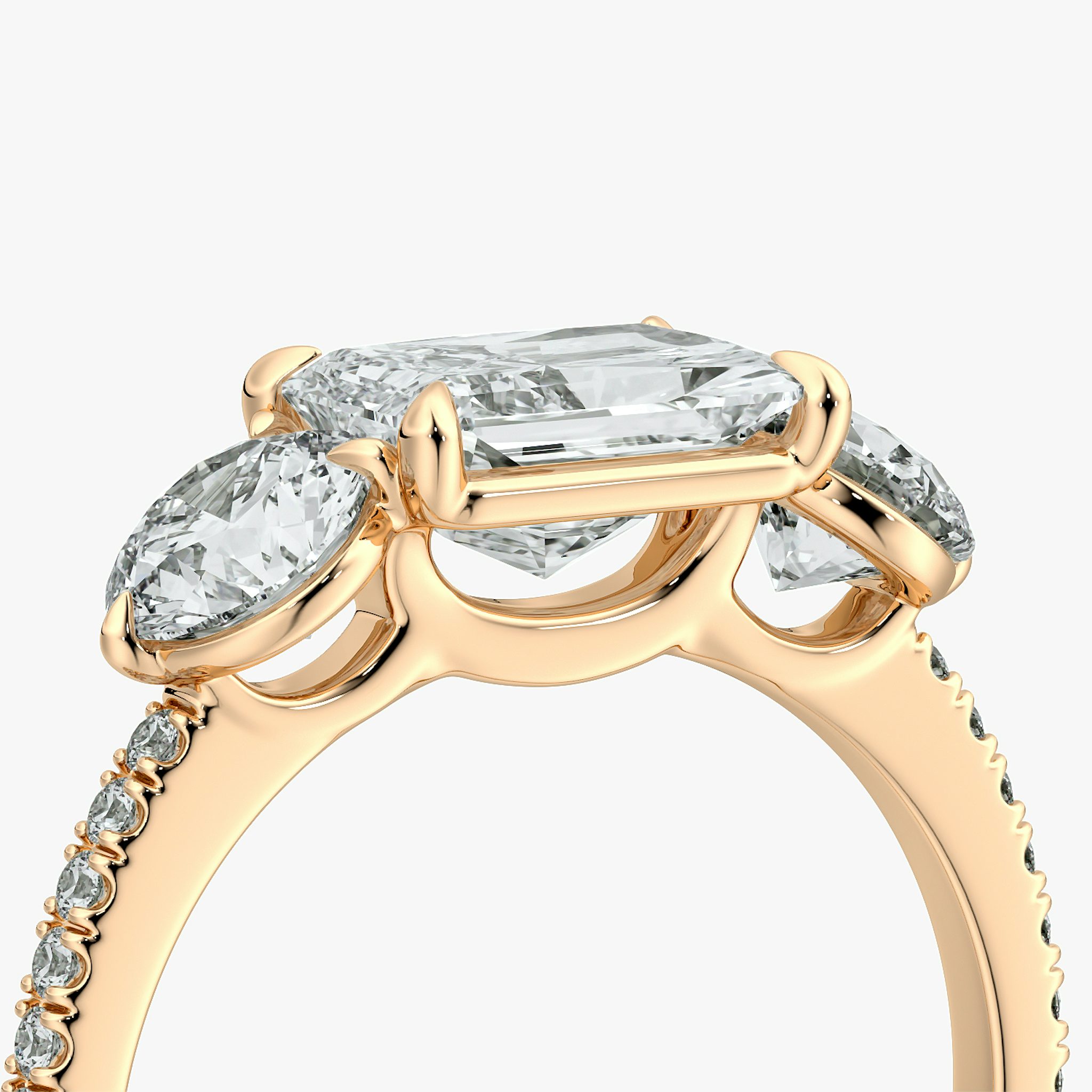 The Three Stone | Radiant | 14k | Rose Gold | bandAccent: Pavé | diamondOrientation: horizontal | sideStoneCarat: 0.50ct | sideStoneShape: Round Brilliant | caratWeight: other