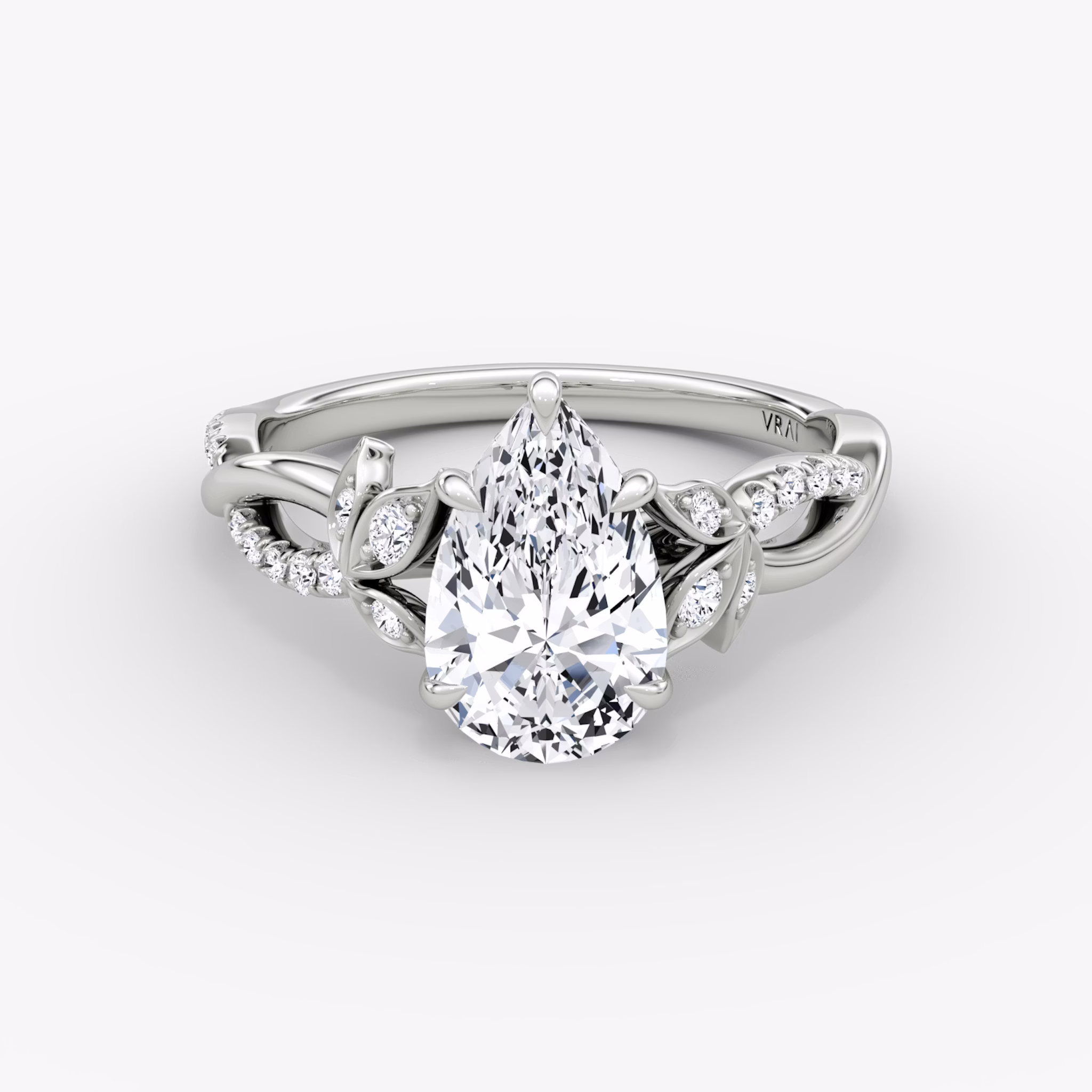 Front view of the twisted floral pear white gold engagement ring
