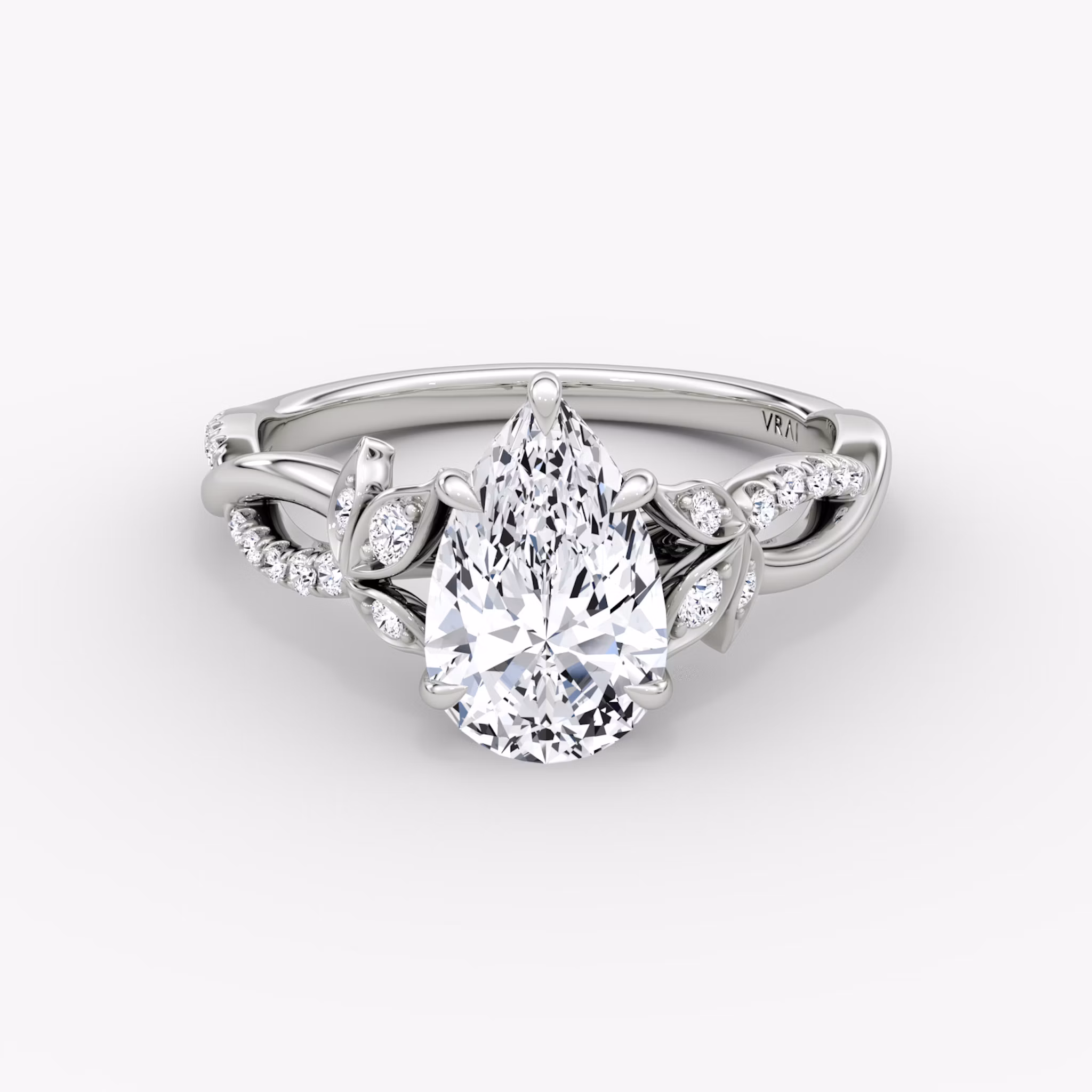 Front view of the twisted floral pear white gold engagement ring