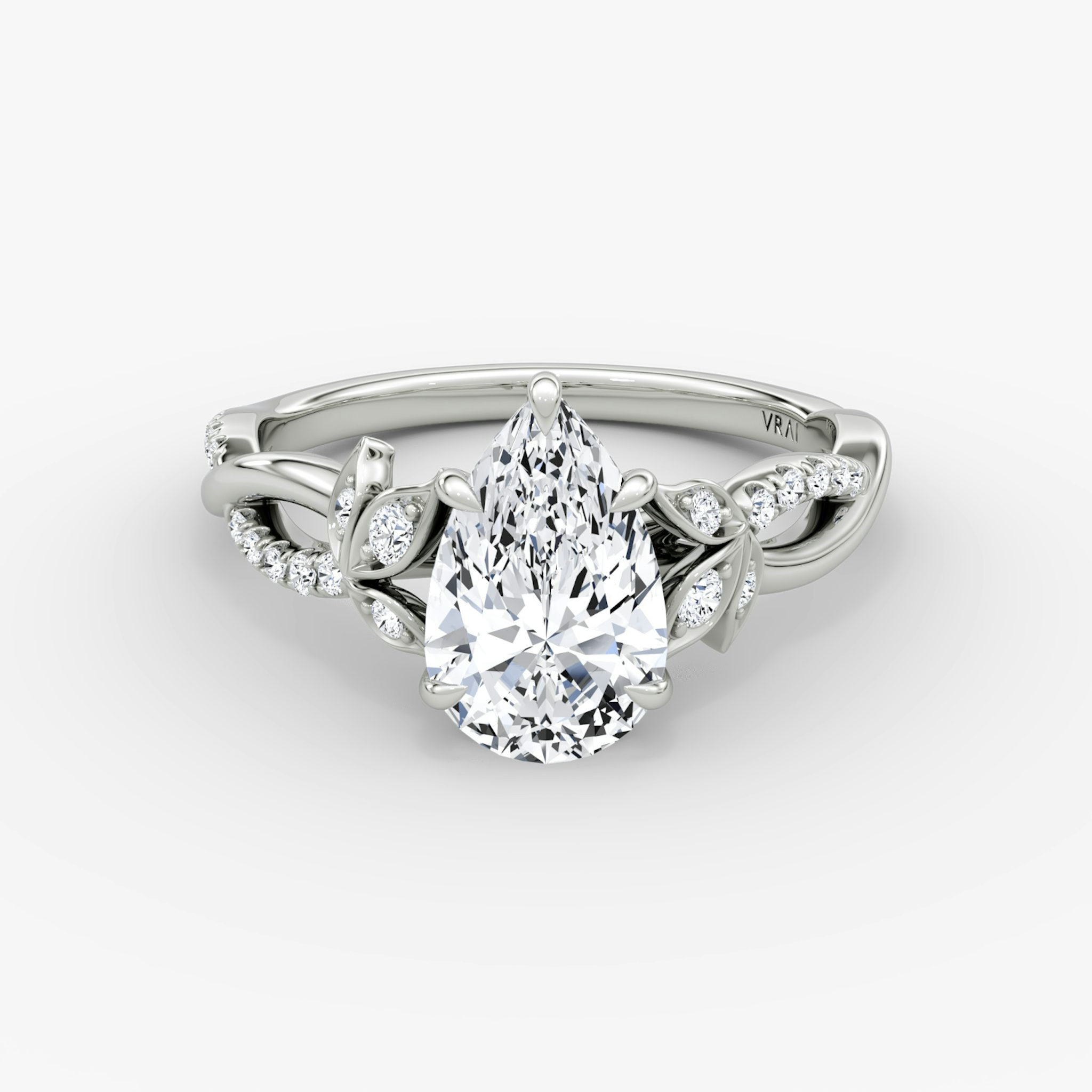 Front view of the twisted floral pear white gold engagement ring