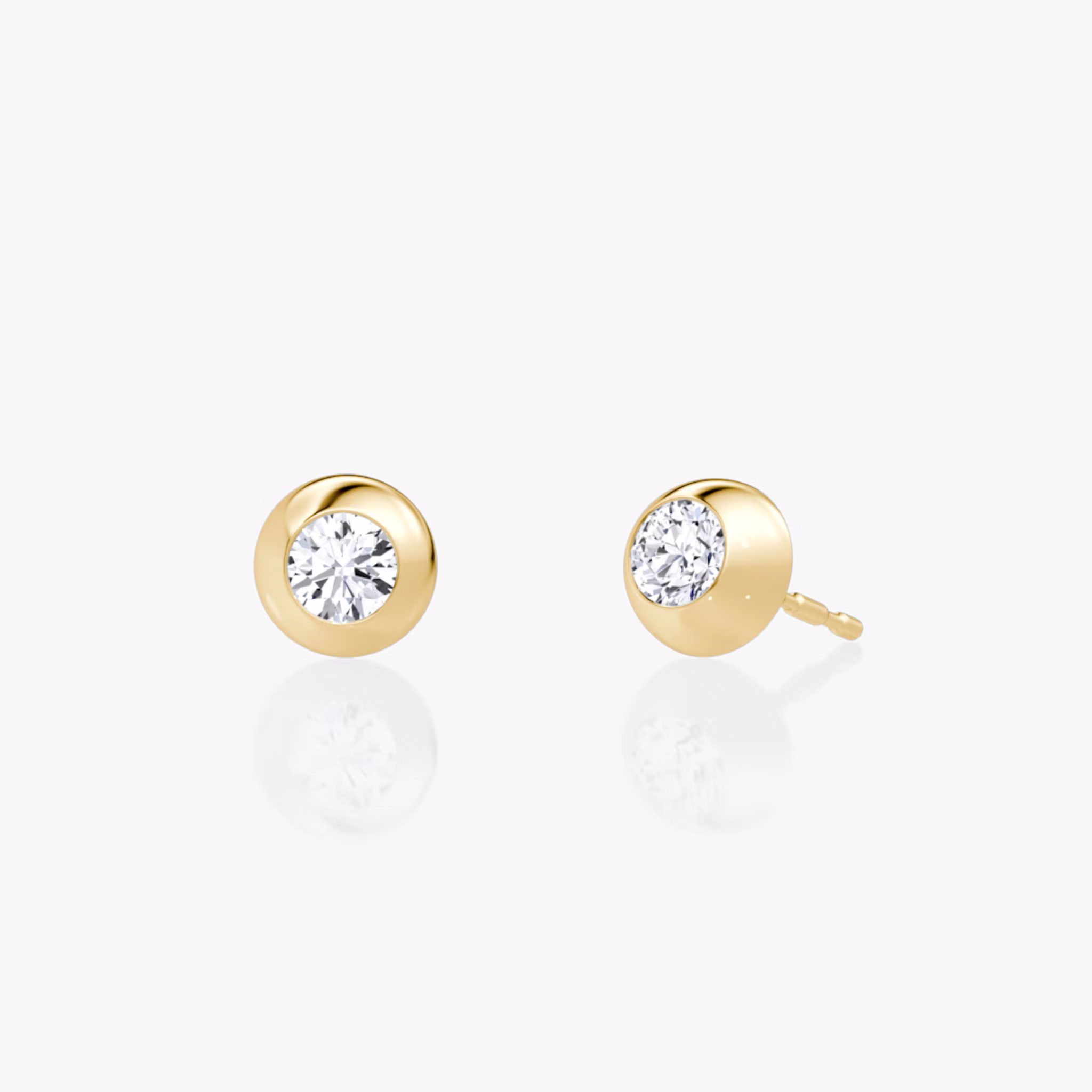 0.25ct round diamond petite dome stud in yellow gold, blending classic sparkle with a smooth, domed setting.