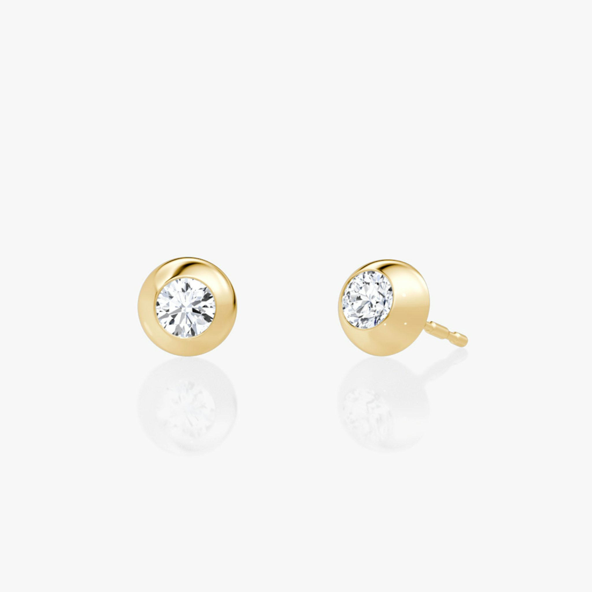 0.25ct round diamond petite dome stud in yellow gold, blending classic sparkle with a smooth, domed setting.