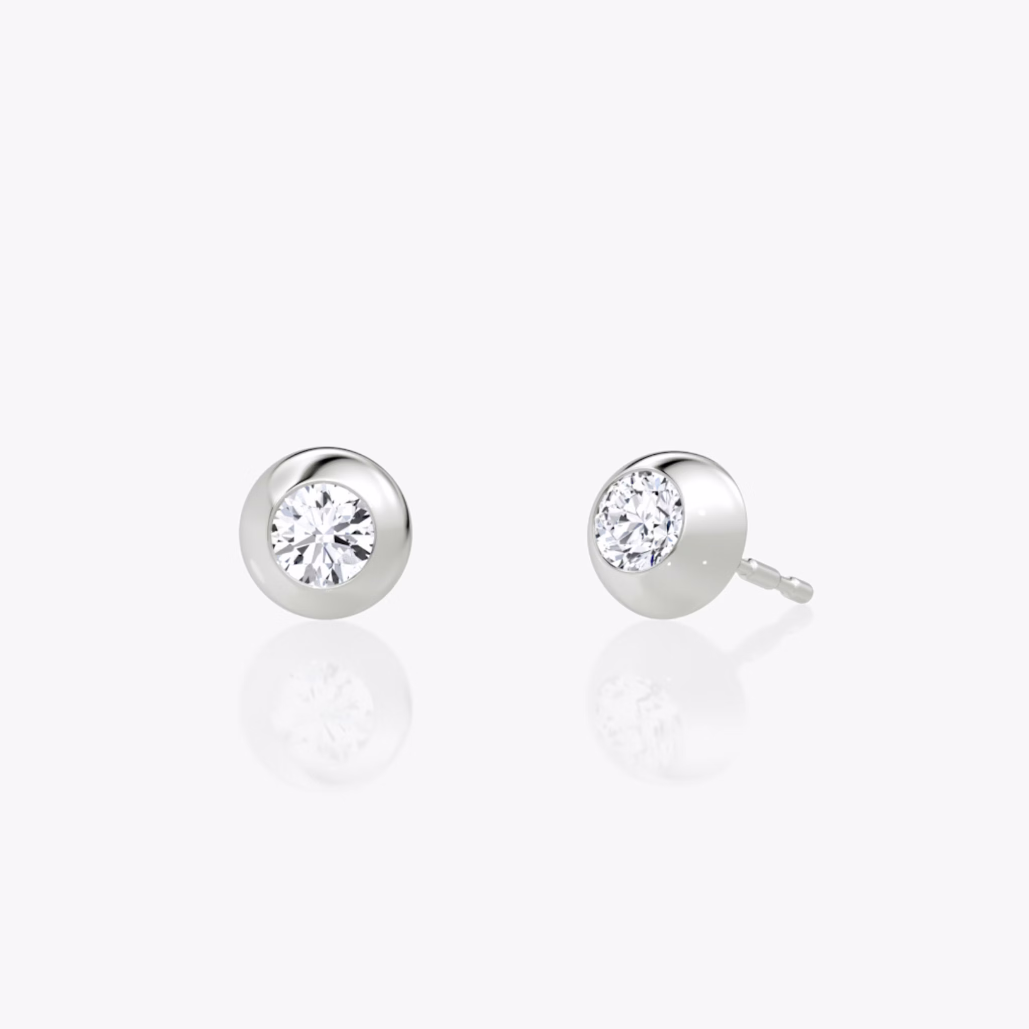 Petite dome stud earring with round 0.25 ct diamond in polished white gold setting.