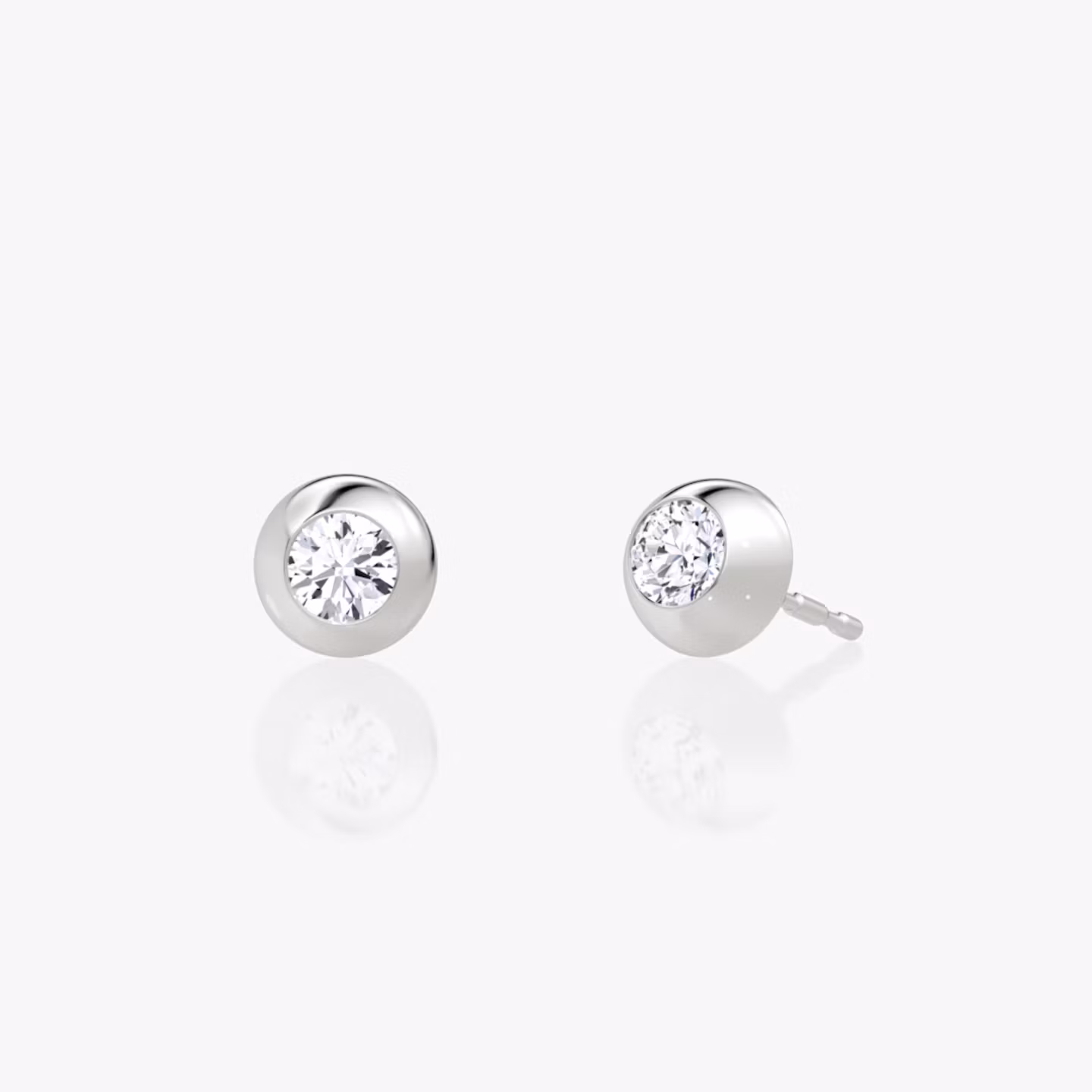 Petite dome stud earring with round 0.25 ct diamond in polished white gold setting.