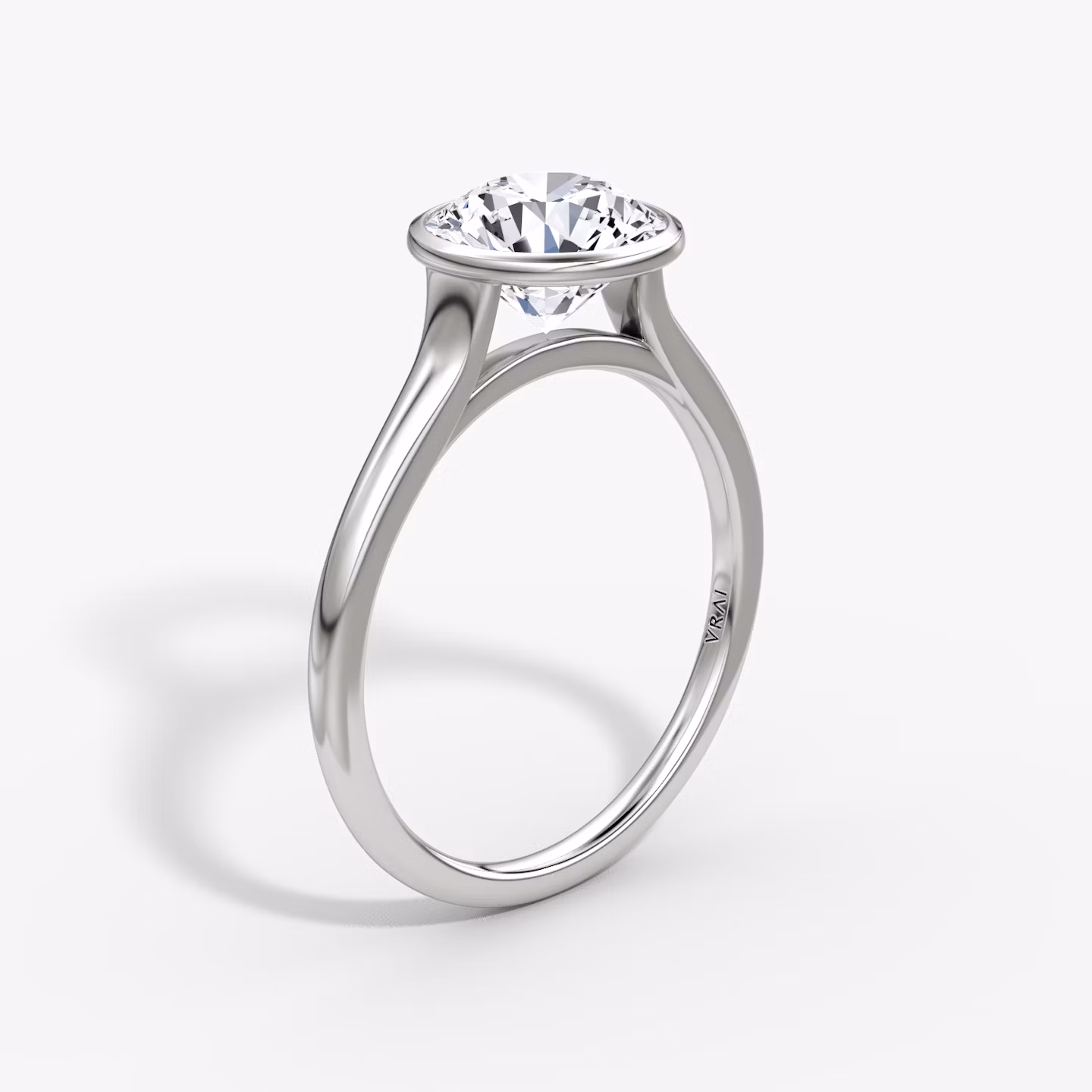 The Flat Edge Bezel | Round Brilliant | Platinum | bandAccent: Plain | caratWeight: other | diamondOrientation: horizontal