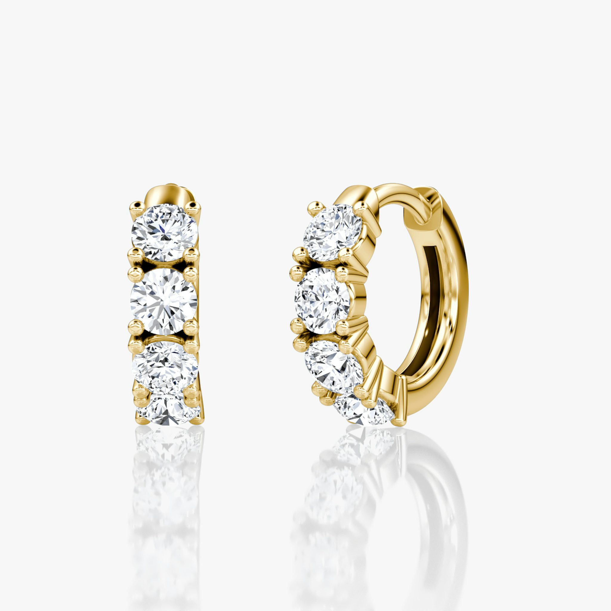 A pair of Pavé Hoops in gold.