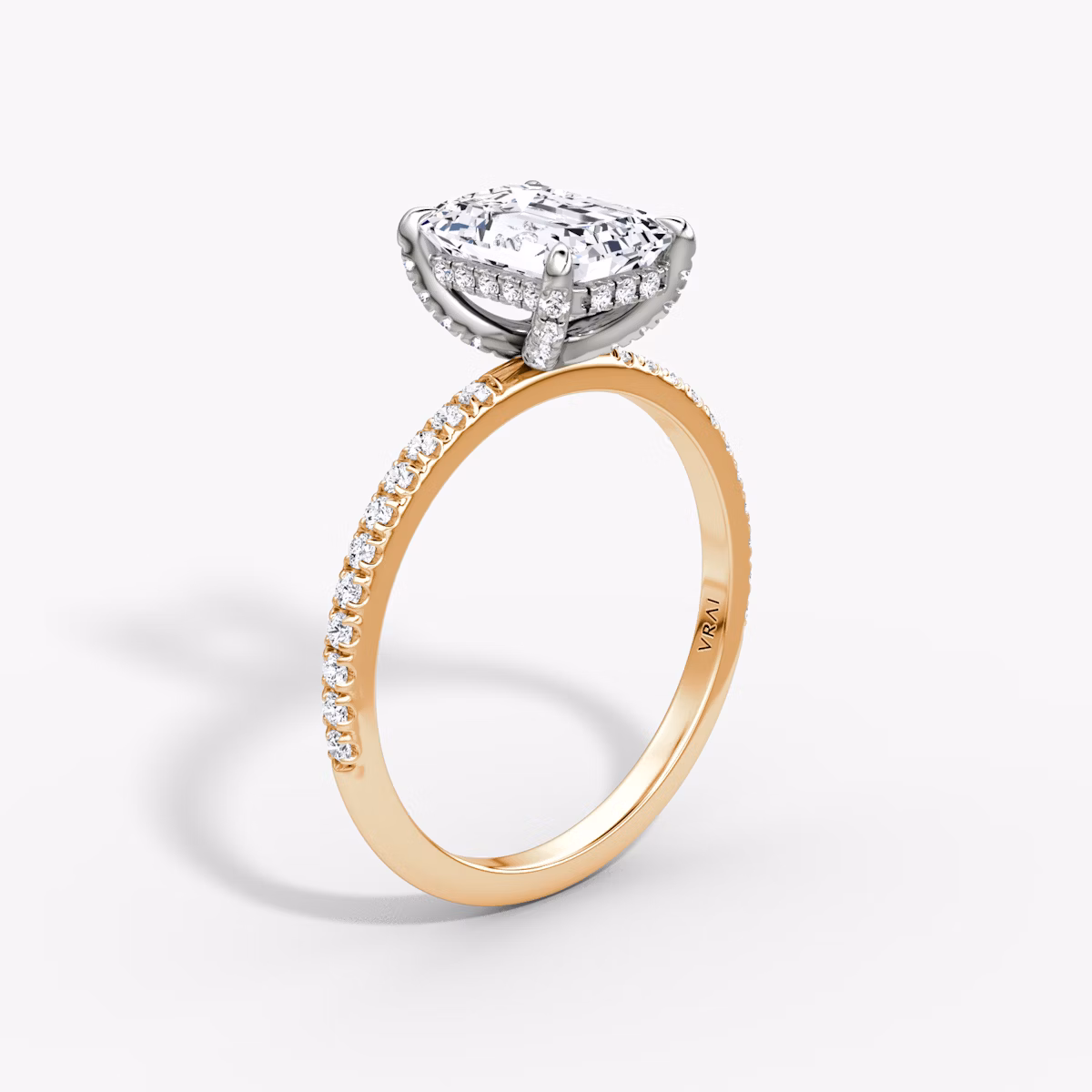 The Classic Hidden Halo | Emerald | 14k | Rose Gold and Platinum | bandAccent: Pavé | bandWidth: standard | prongStyle: Pavé | diamondOrientation: vertical | caratWeight: other