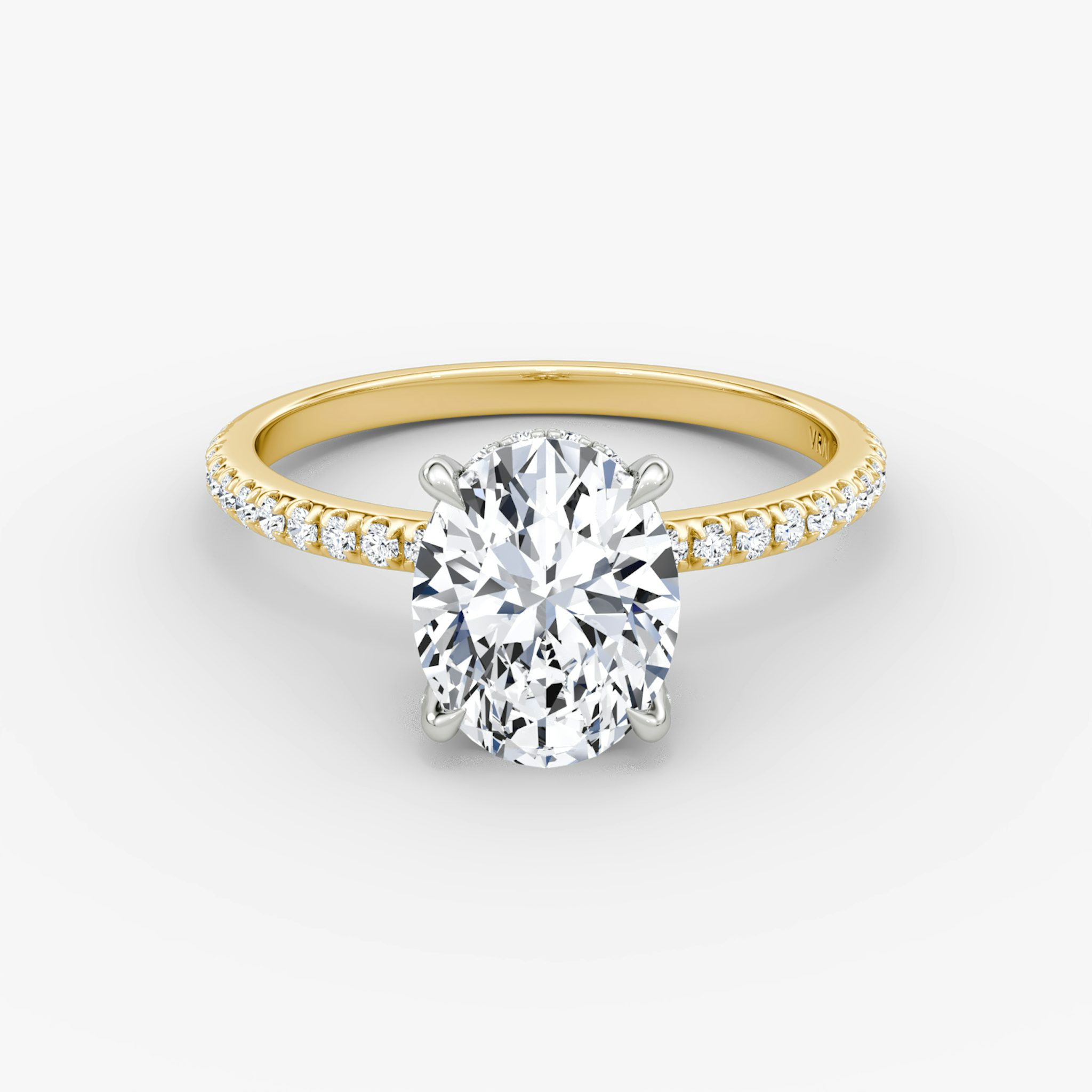 The Classic Hidden Halo | Oval | 18k | Yellow Gold and Platinum | bandAccent: Pavé | bandWidth: standard | prongStyle: Pavé | diamondOrientation: vertical | caratWeight: other