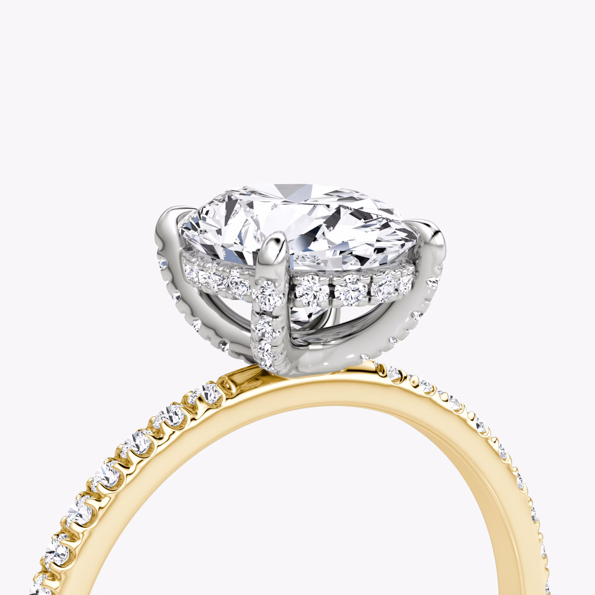 The Classic Hidden Halo | Oval | 18k | Yellow Gold and Platinum | bandAccent: Pavé | bandWidth: standard | prongStyle: Pavé | diamondOrientation: vertical | caratWeight: other