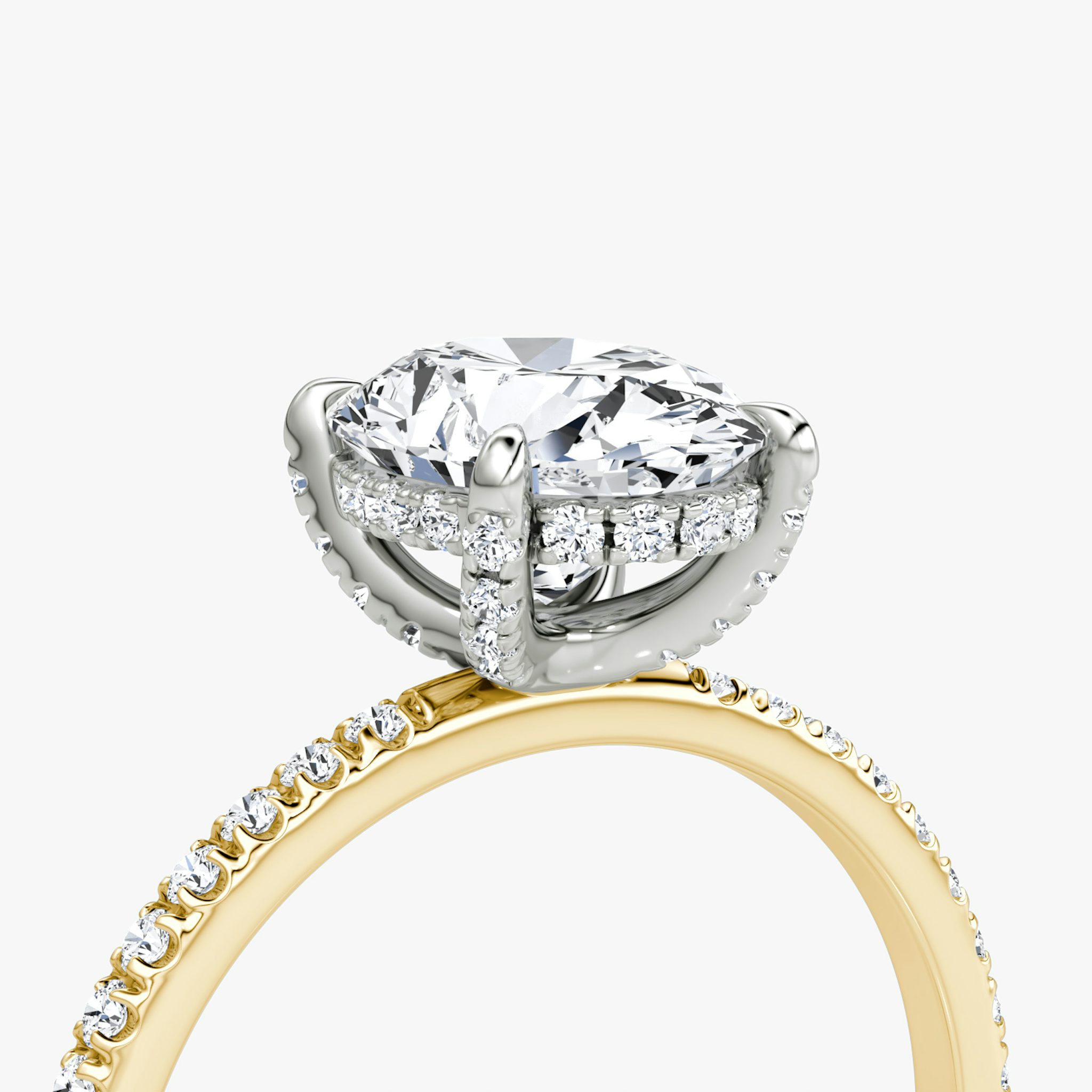 The Classic Hidden Halo | Oval | 18k | Yellow Gold and Platinum | bandAccent: Pavé | bandWidth: standard | prongStyle: Pavé | diamondOrientation: vertical | caratWeight: other