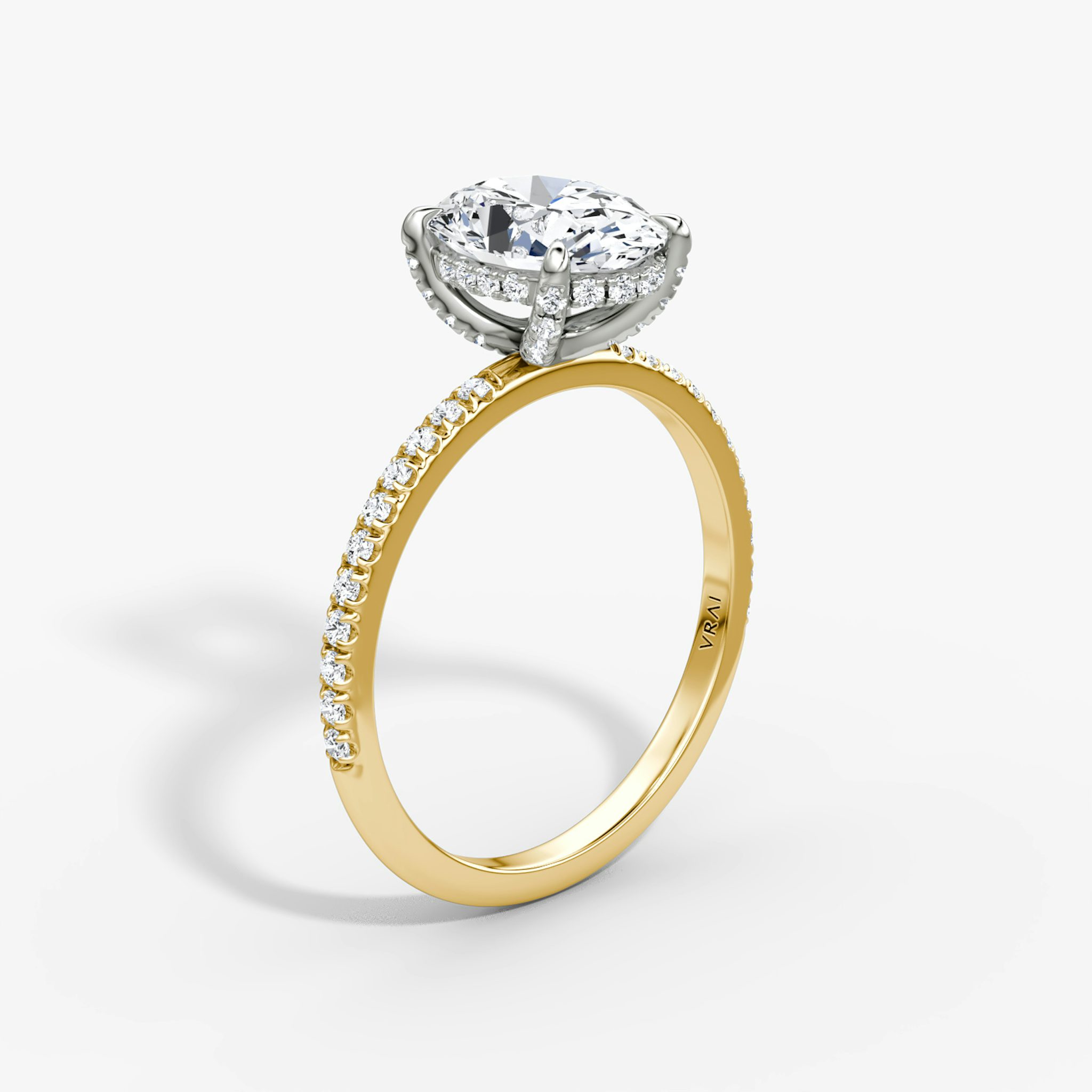 The Classic Hidden Halo | Oval | 18k | Yellow Gold and Platinum | bandAccent: Pavé | bandWidth: standard | prongStyle: Pavé | diamondOrientation: vertical | caratWeight: other