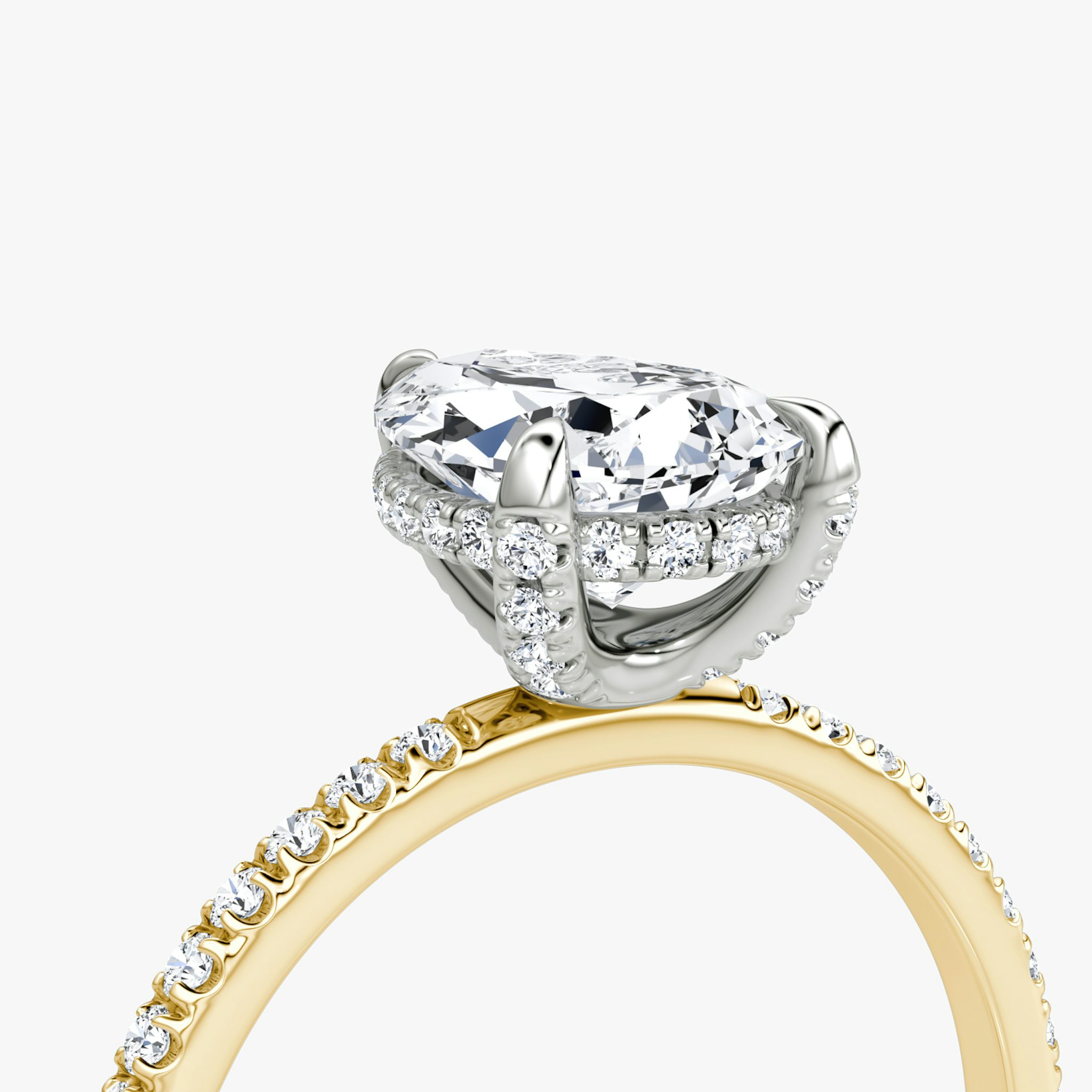 The Classic Hidden Halo | Pear | 18k | Yellow Gold and Platinum | bandAccent: Pavé | bandWidth: standard | prongStyle: Pavé | diamondOrientation: vertical | caratWeight: other