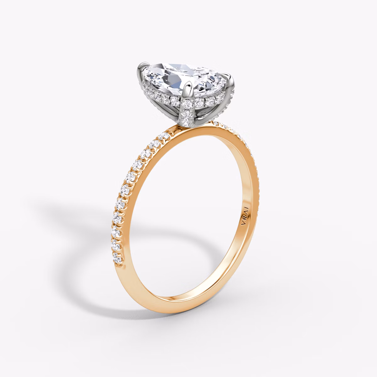 The Classic Hidden Halo | Pear | 14k | Rose Gold and Platinum | bandAccent: Pavé | bandWidth: standard | prongStyle: Pavé | diamondOrientation: vertical | caratWeight: other