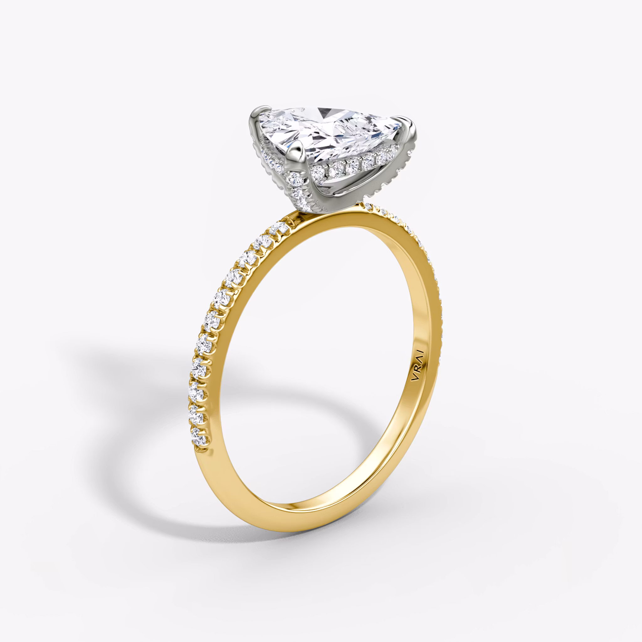 The Classic Hidden Halo Trillion | 18K Yellow Gold and Platinum