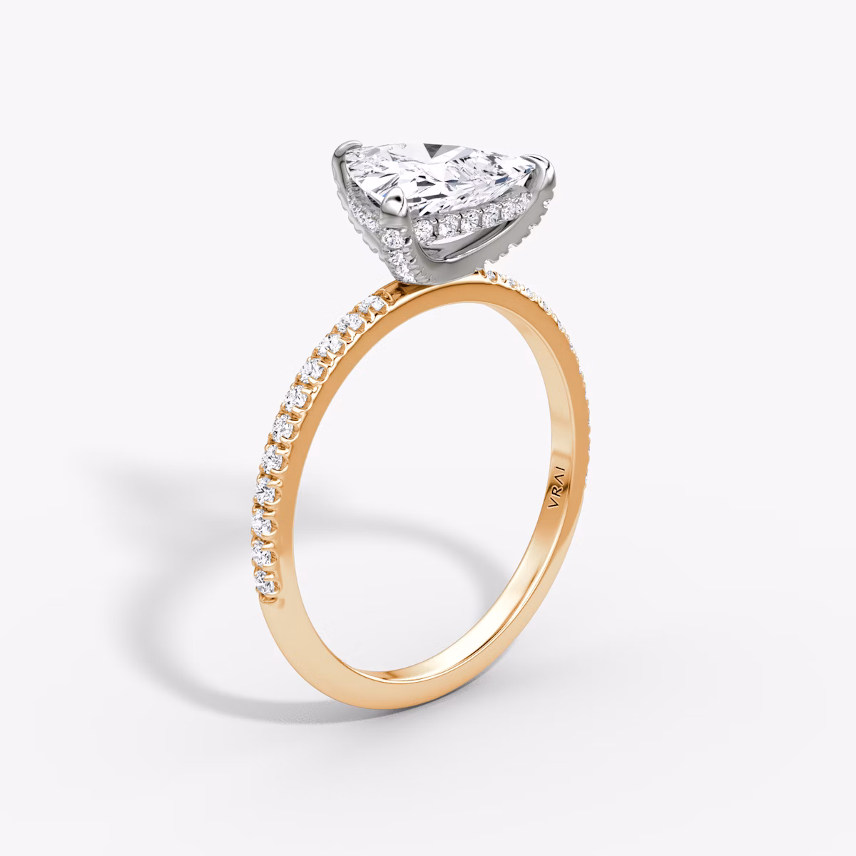 The Classic Hidden Halo | Trillion | 14k | Rose Gold and Platinum | bandAccent: Pavé | bandWidth: standard | prongStyle: Pavé | diamondOrientation: vertical | caratWeight: other