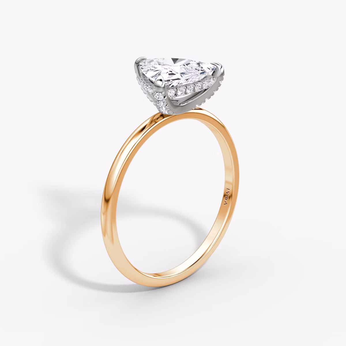 The Classic Hidden Halo | Trillion | 14k | Rose Gold and Platinum | bandAccent: Plain | bandWidth: standard | prongStyle: Pavé | diamondOrientation: vertical | caratWeight: other
