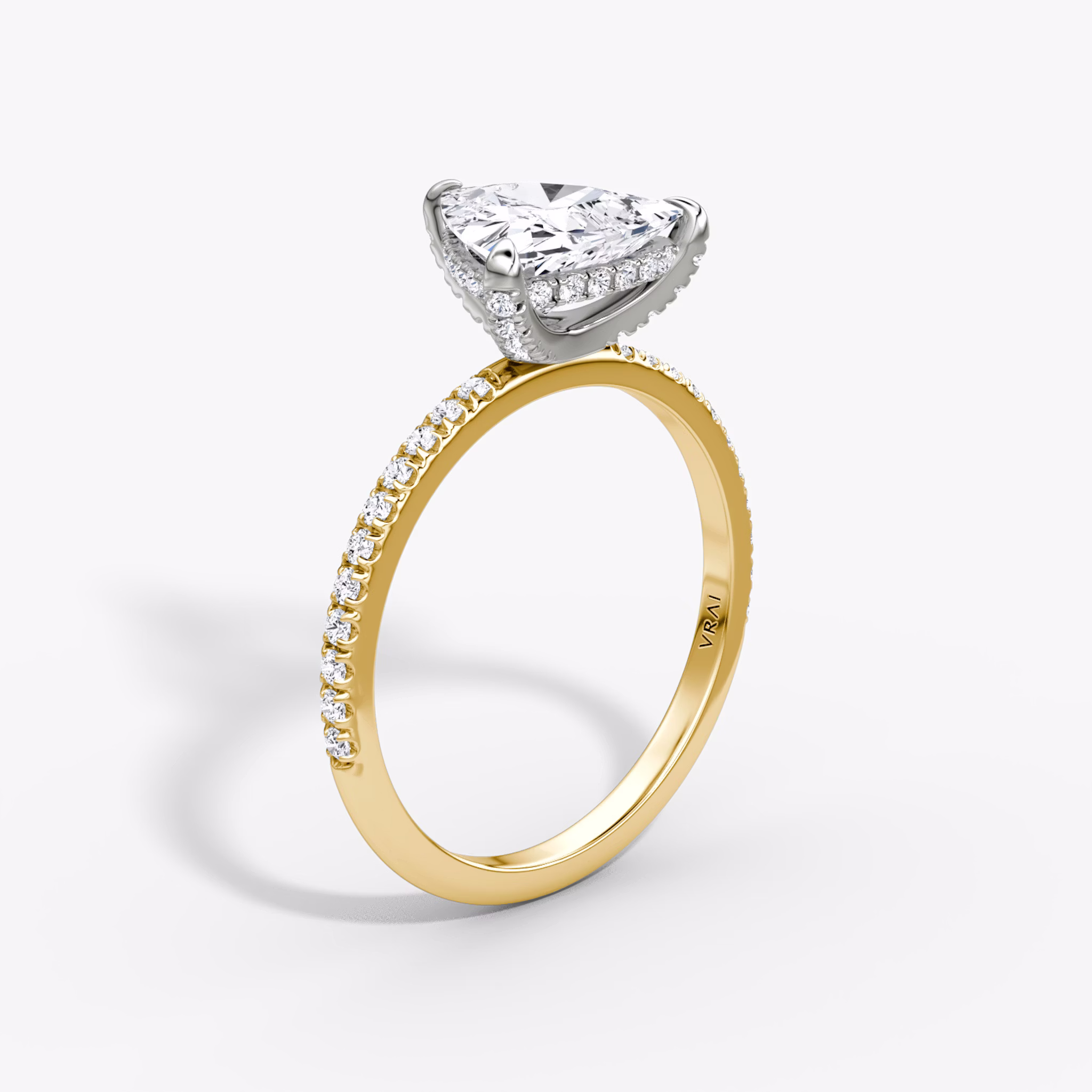 The Classic Hidden Halo | Trillion | 18k | Yellow Gold and Platinum | bandAccent: Plain | bandWidth: standard | prongStyle: Pavé | diamondOrientation: vertical | caratWeight: other