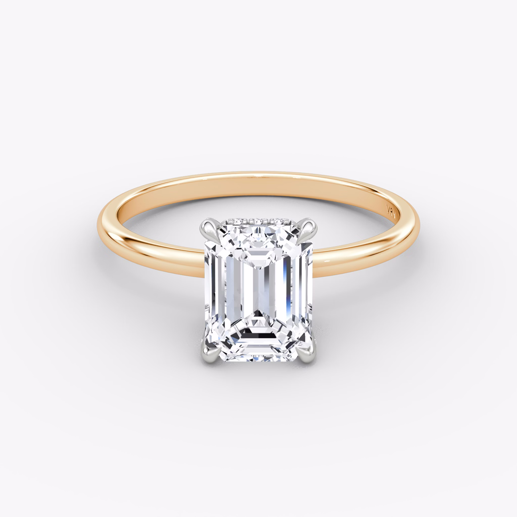 The Classic Hidden Halo | Emerald | 14k | Rose Gold and Platinum | bandAccent: Plain | bandWidth: standard | prongStyle: Pavé | diamondOrientation: vertical | caratWeight: other