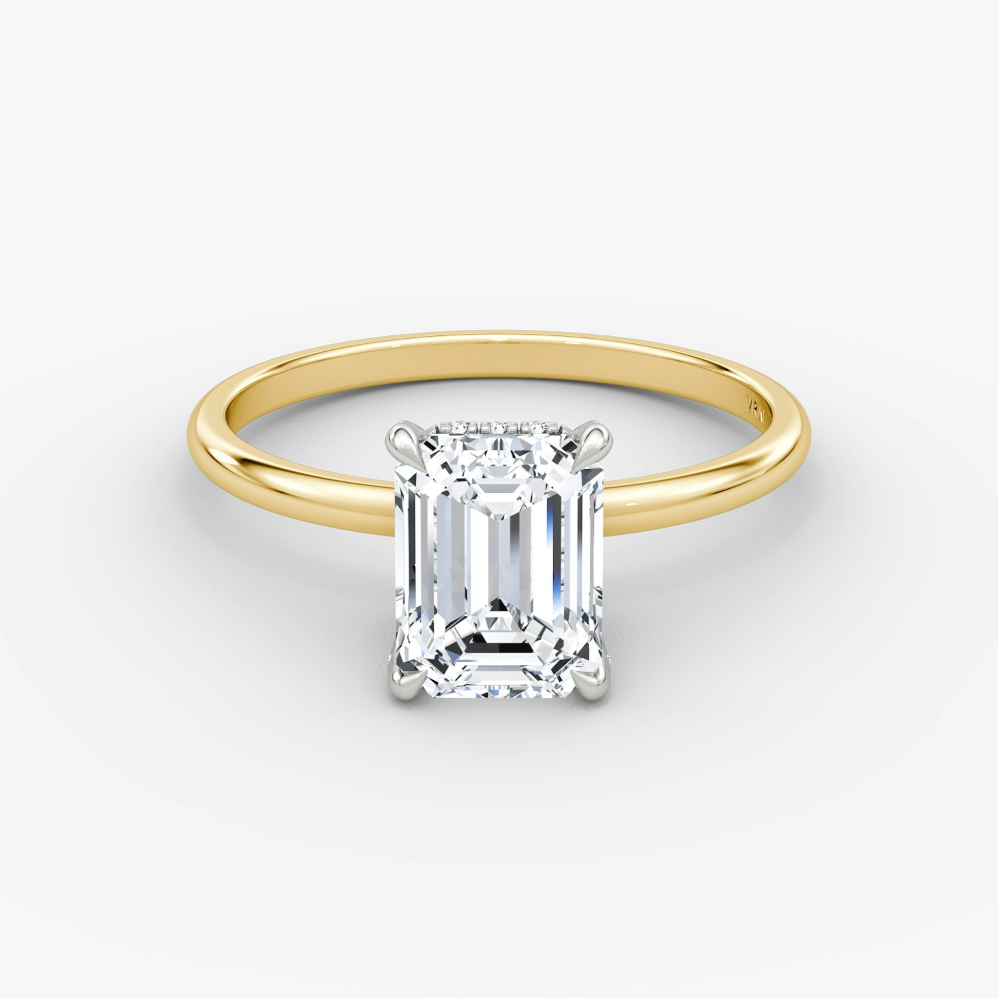 The Classic Hidden Halo | Emerald | 18k | Yellow Gold and Platinum | bandAccent: Plain | bandWidth: standard | prongStyle: Pavé | diamondOrientation: vertical | caratWeight: other