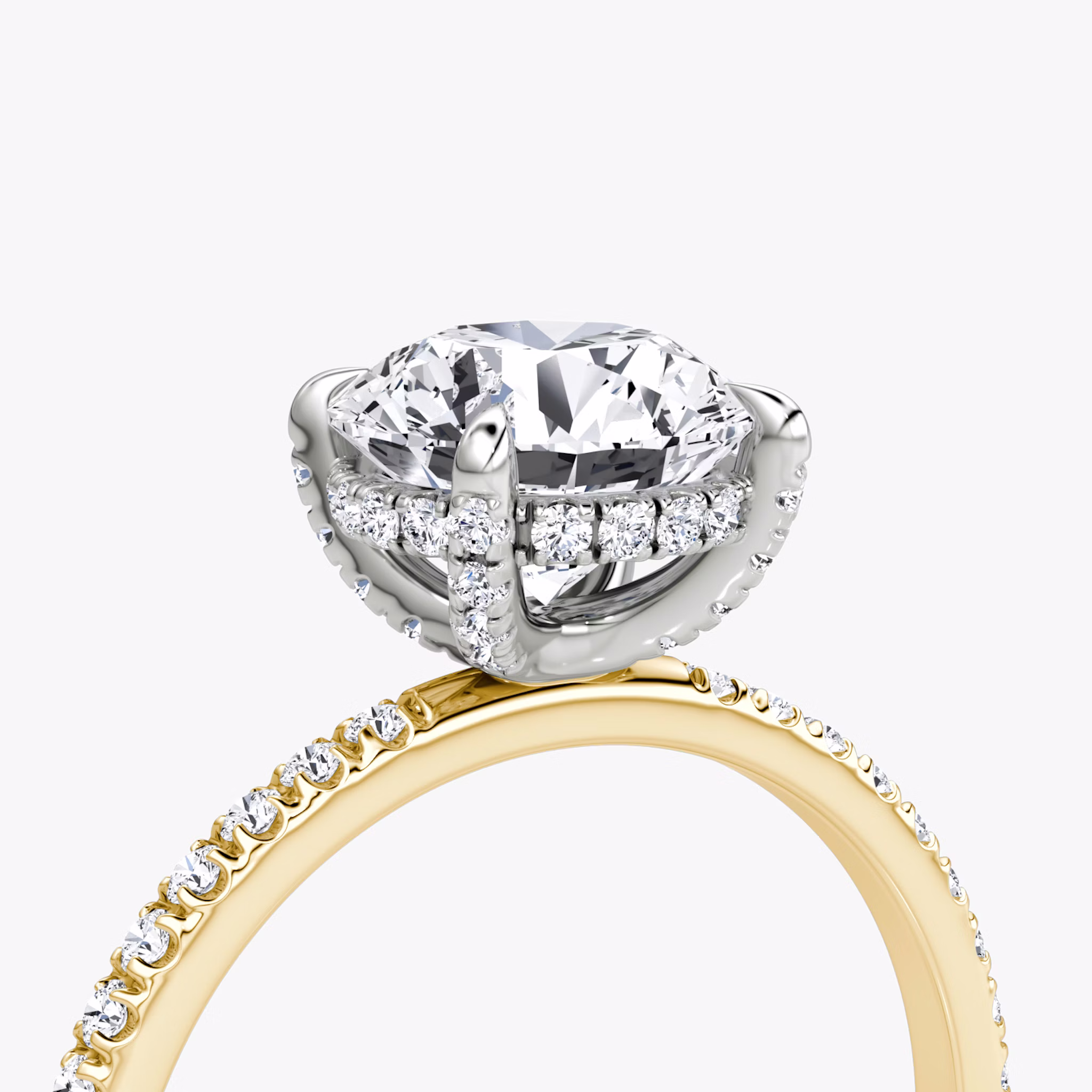 The Classic Hidden Halo | Round Brilliant | 18k | Yellow Gold and Platinum | bandAccent: Pavé | bandWidth: standard | caratWeight: other | prongStyle: Pavé | diamondOrientation: vertical