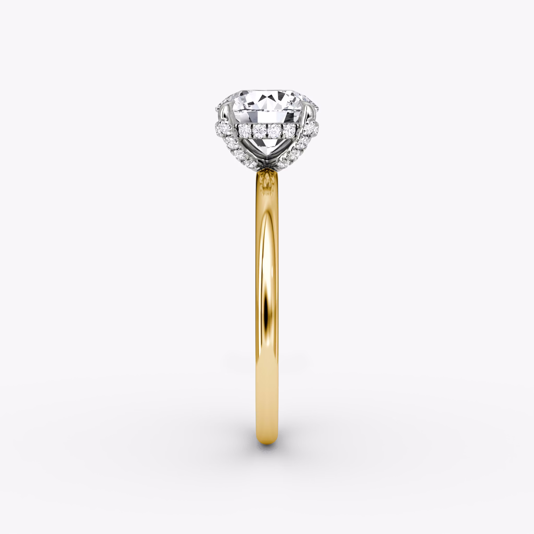 The Classic Hidden Halo | Round Brilliant | 18k | Yellow Gold and Platinum | bandAccent: Plain | bandWidth: standard | caratWeight: other | prongStyle: Pavé | diamondOrientation: vertical