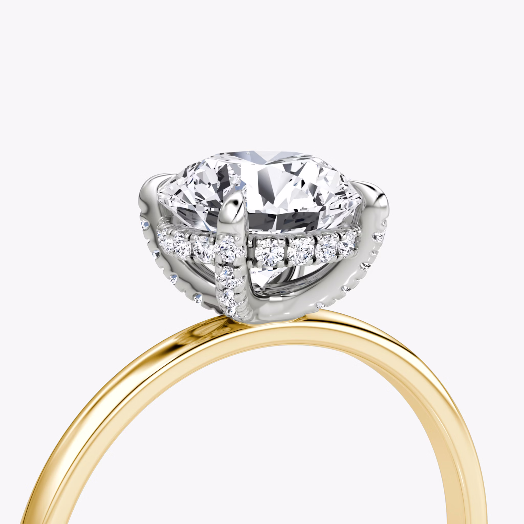 The Classic Hidden Halo | Round Brilliant | 18k | Yellow Gold and Platinum | bandAccent: Plain | bandWidth: standard | caratWeight: other | prongStyle: Pavé | diamondOrientation: vertical