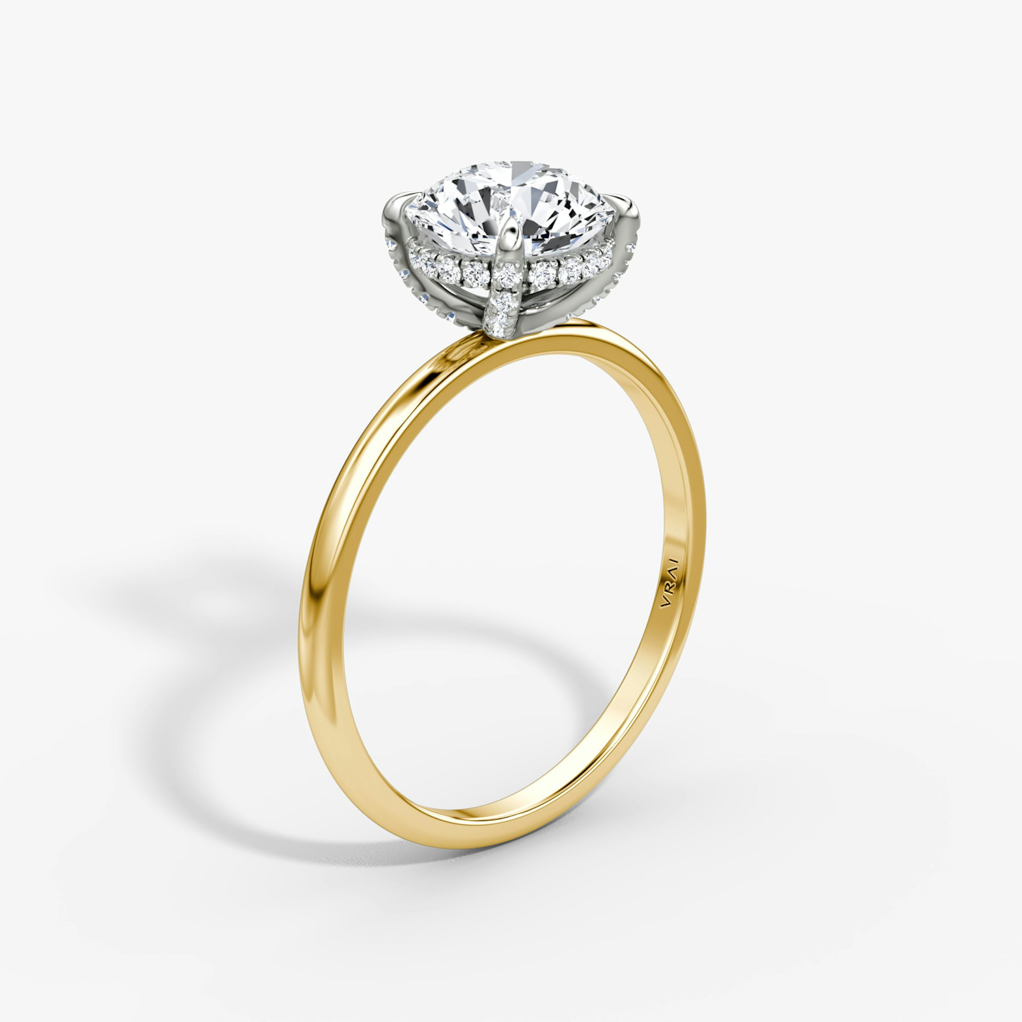 The Classic Hidden Halo | Round Brilliant | 18k | Yellow Gold and Platinum | bandAccent: Plain | bandWidth: standard | caratWeight: other | prongStyle: Pavé | diamondOrientation: vertical