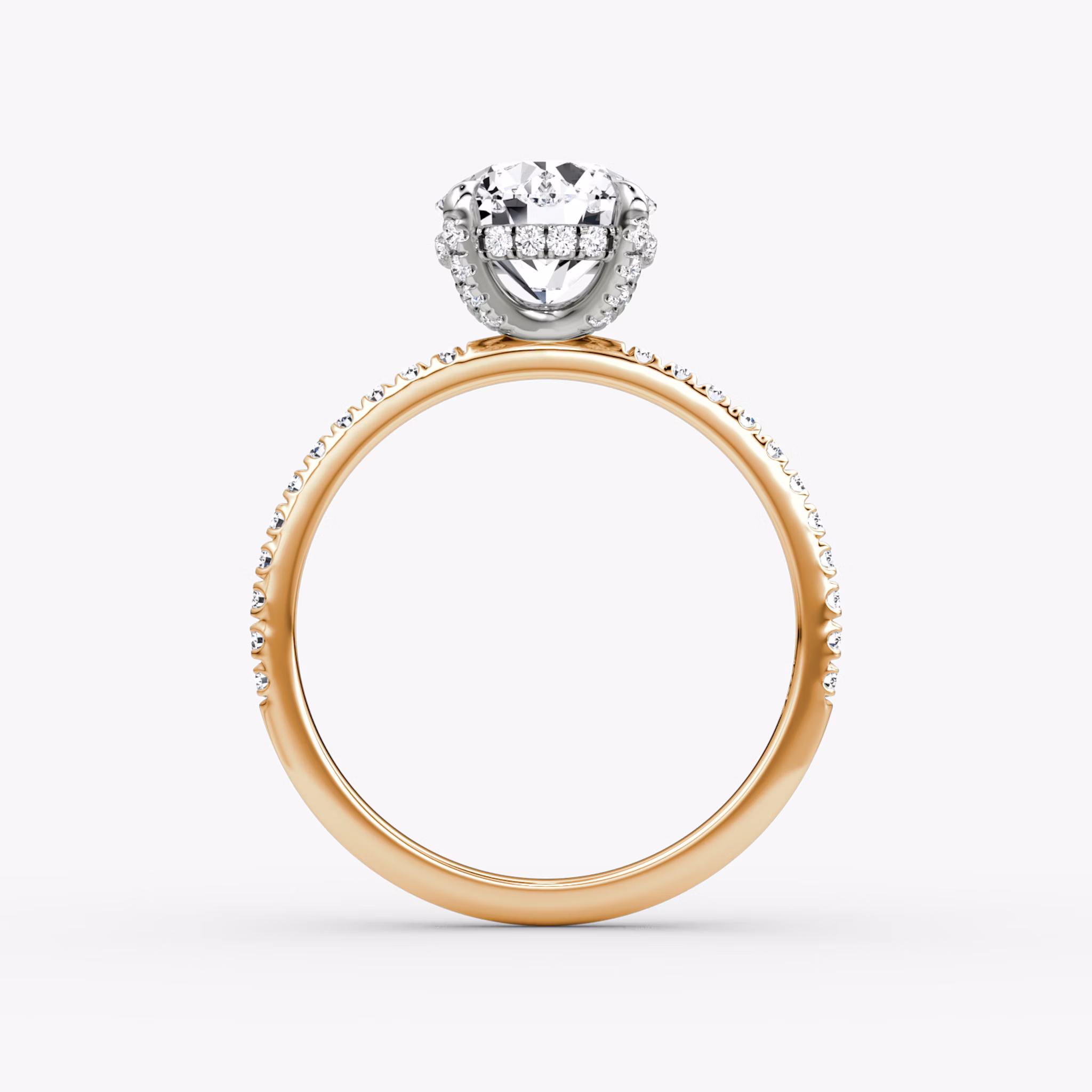 The Classic Hidden Halo | Round Brilliant | 14k | Rose Gold and Platinum | bandAccent: Pavé | bandWidth: standard | caratWeight: other | prongStyle: Pavé | diamondOrientation: vertical