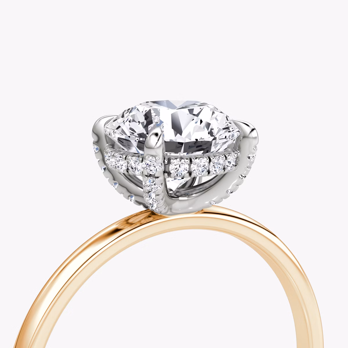 The Classic Hidden Halo | Round Brilliant | 14k | Rose Gold and Platinum | bandAccent: Plain | bandWidth: standard | caratWeight: other | prongStyle: Pavé | diamondOrientation: vertical