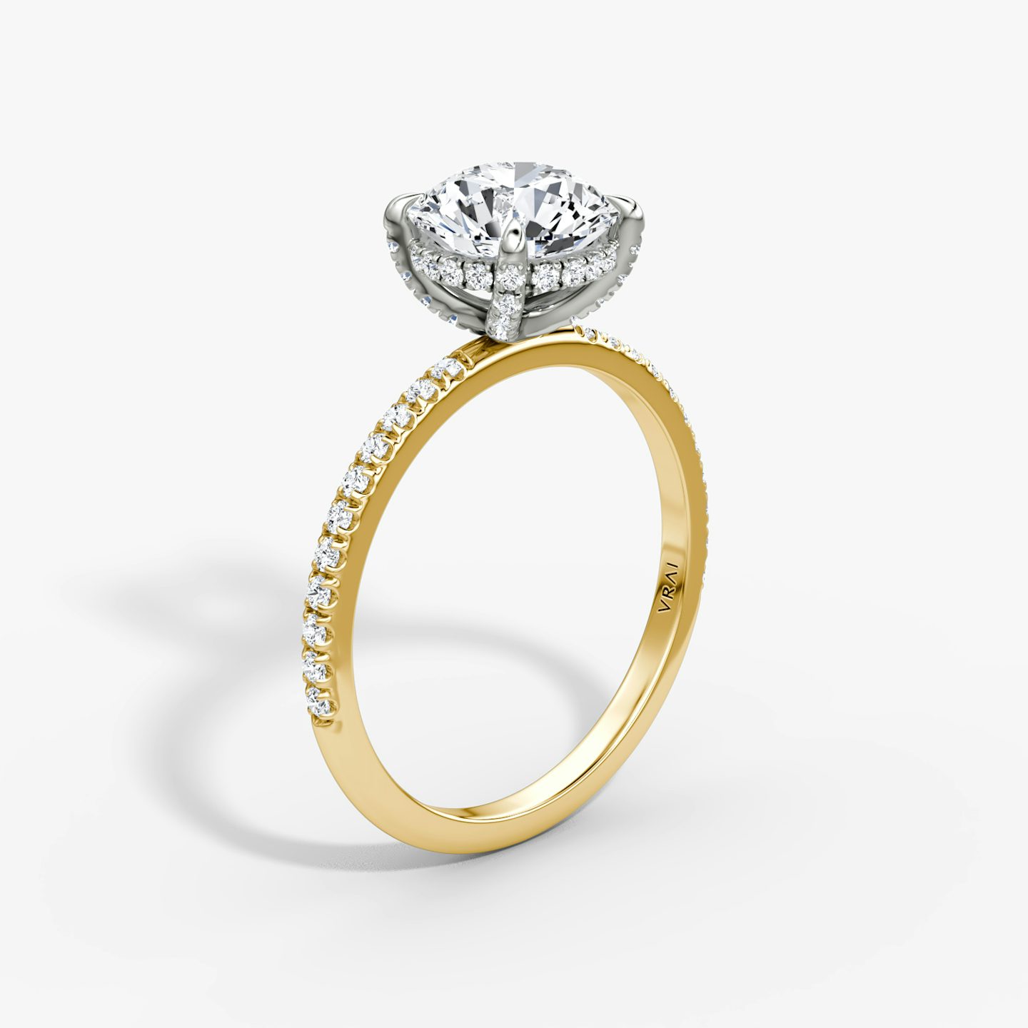 The Classic Hidden Halo | Round Brilliant | 18k | Yellow Gold and Platinum | bandAccent: Pavé | bandWidth: standard | caratWeight: 1.0ct | prongStyle: Pavé | diamondOrientation: vertical